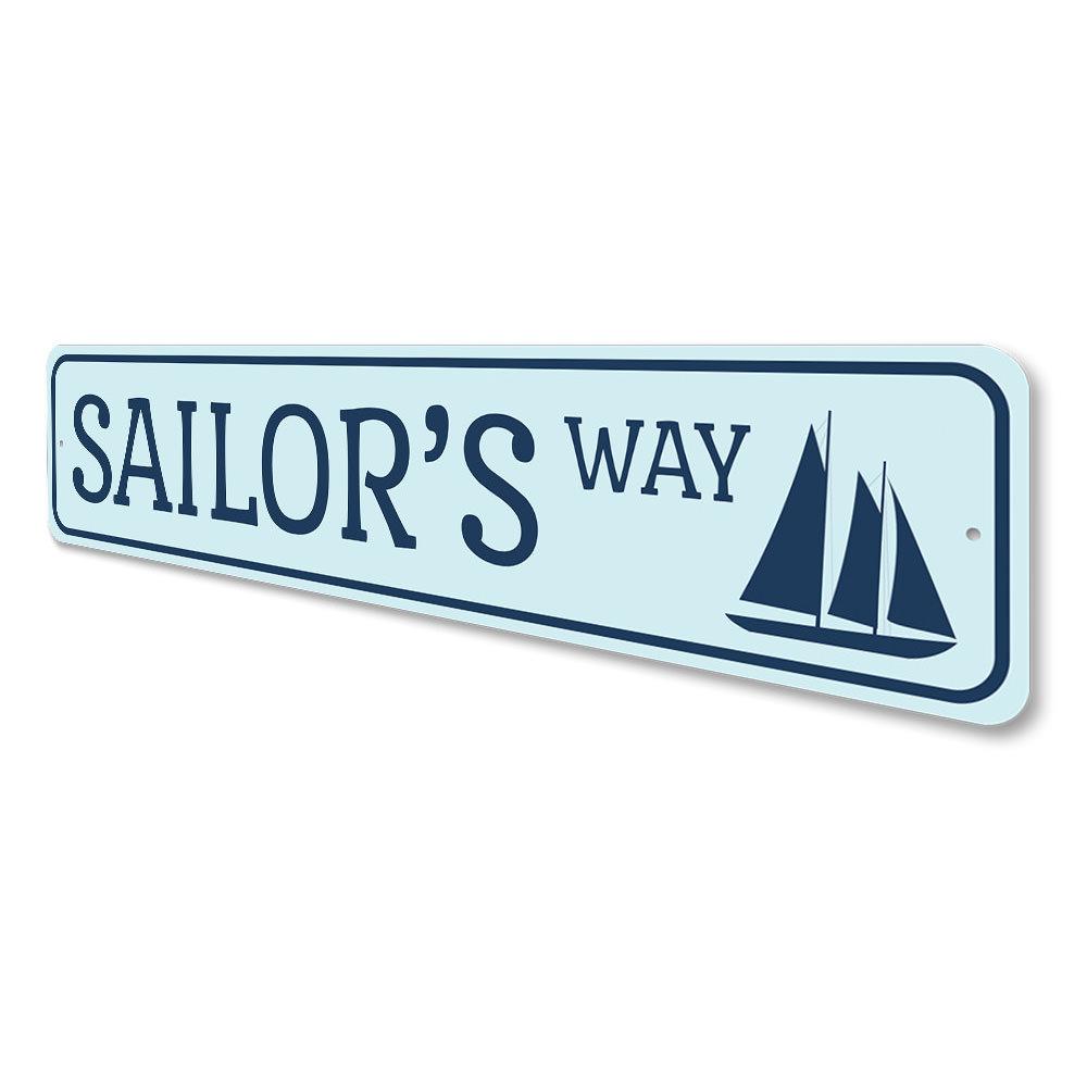 Sailors Way Sign made of high-quality aluminum, featuring nautical design elements, perfect for beach-themed decor.