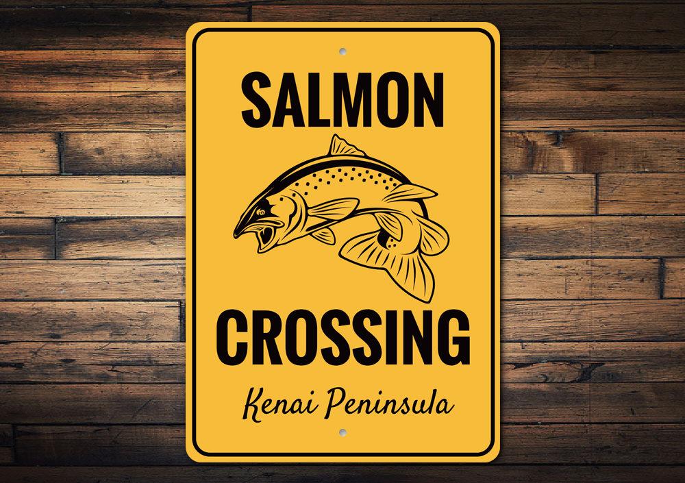 A decorative Salmon Crossing Sign made of high-quality aluminum, featuring a vibrant design perfect for lakehouse decor.