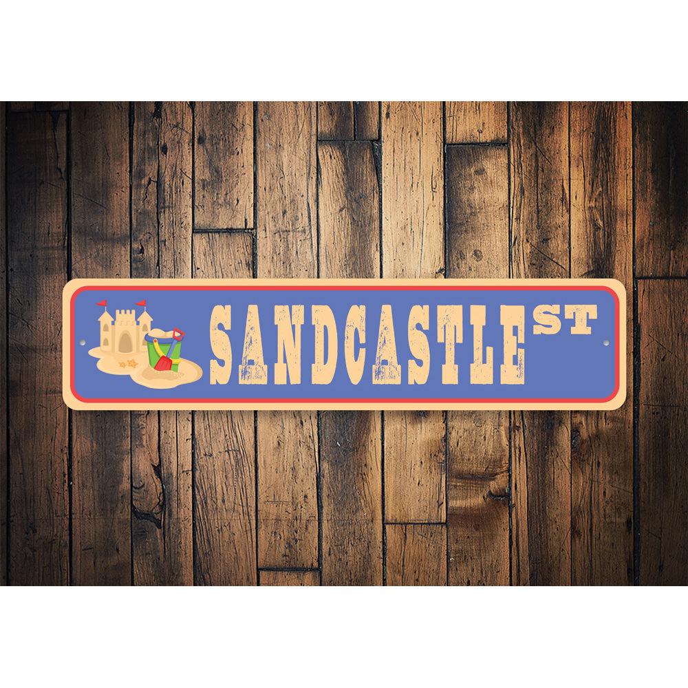 A decorative Sandcastle Street Sign made of high-quality aluminum, featuring customizable text options, ideal for home decor.