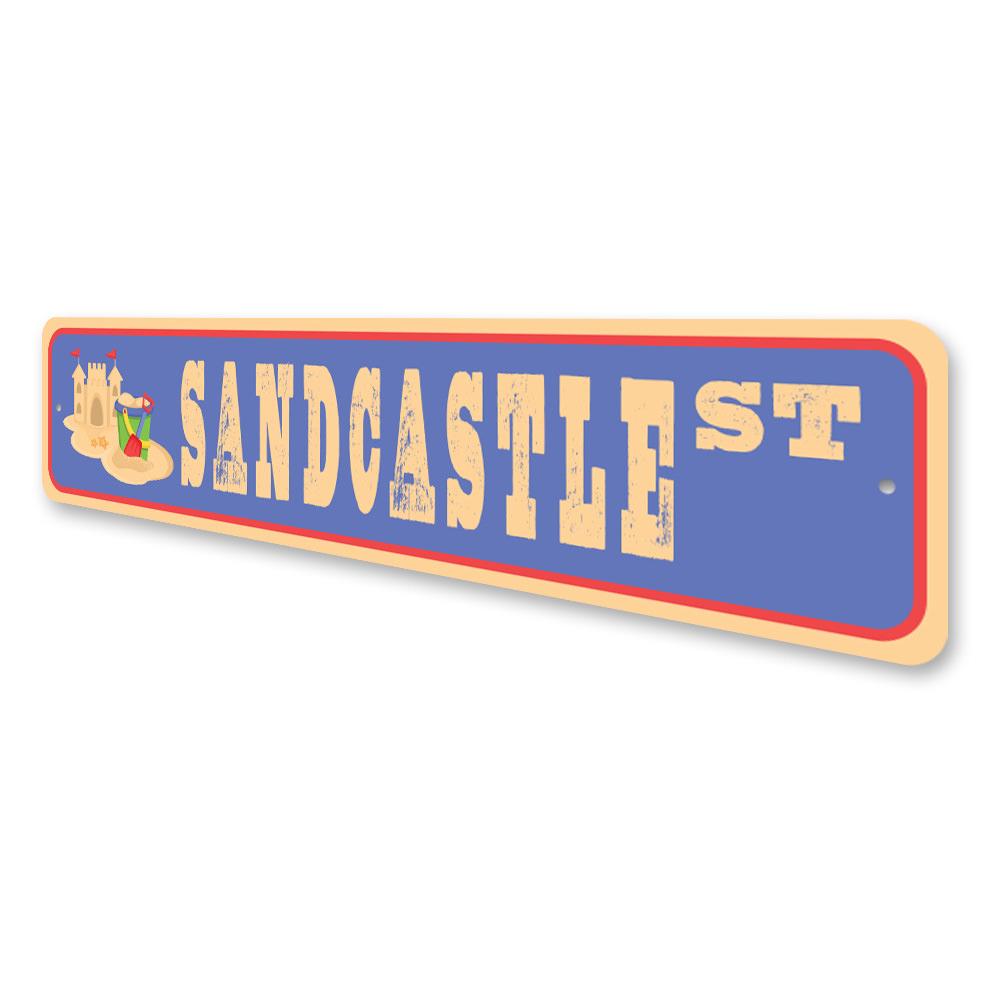 A decorative Sandcastle Street Sign made of high-quality aluminum, featuring customizable text options, ideal for home decor.
