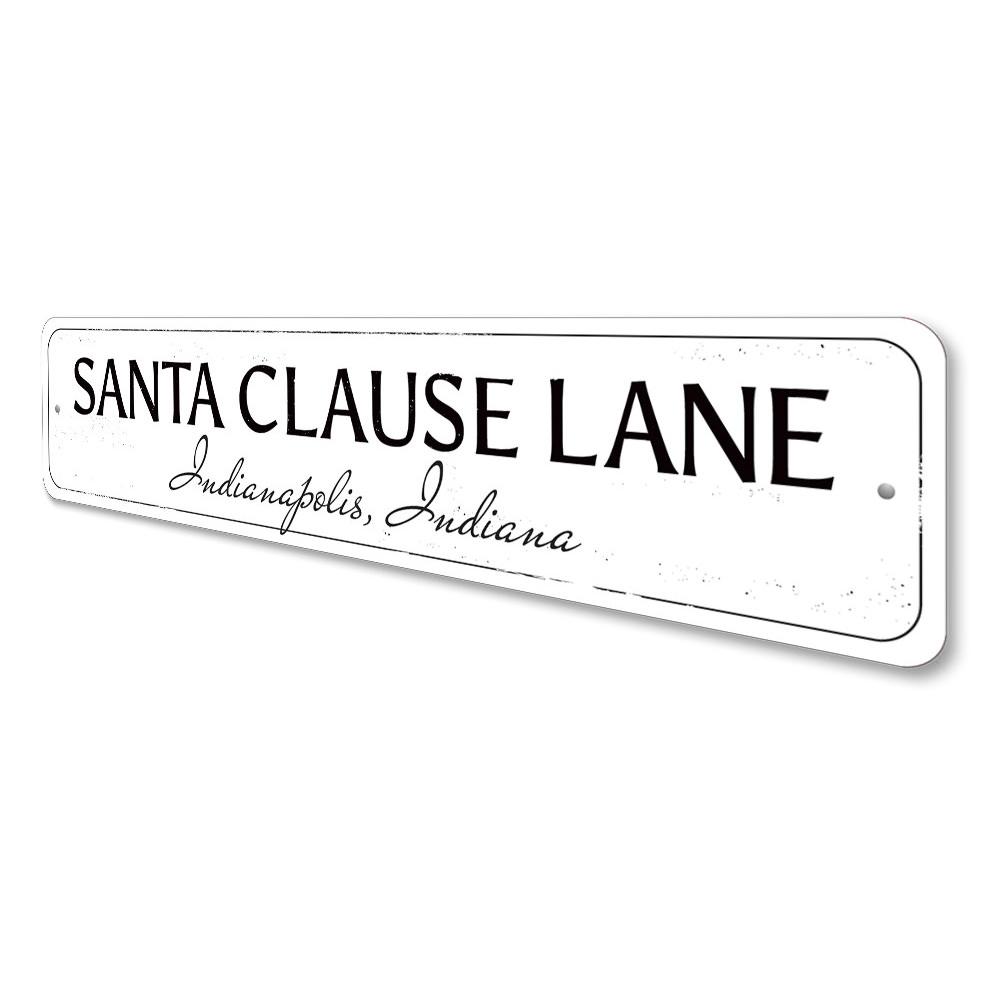 Santa Clause Lane Sign featuring festive design, made from high-quality aluminum, perfect for holiday decorations.
