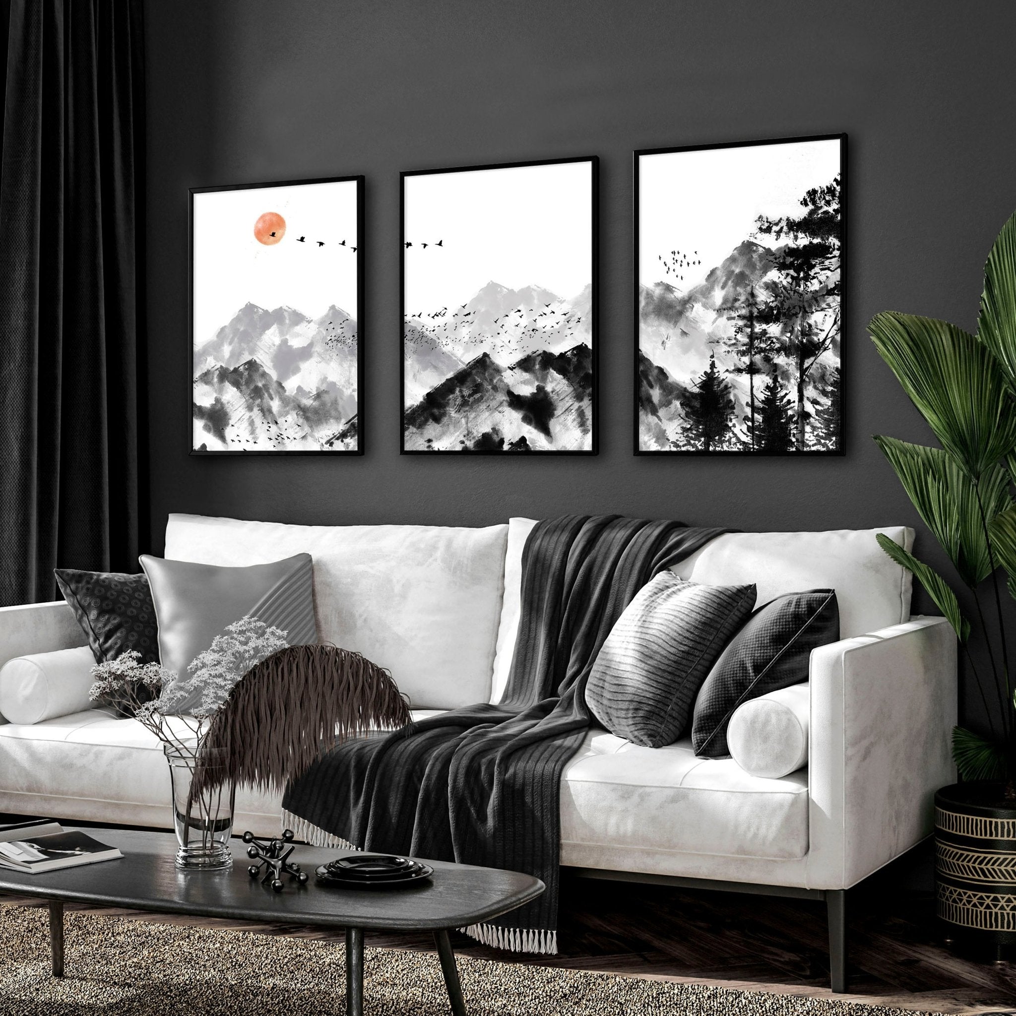 Set of 3 Scandi wall art prints featuring modern minimalist designs in grey, black, and white, elegantly framed.