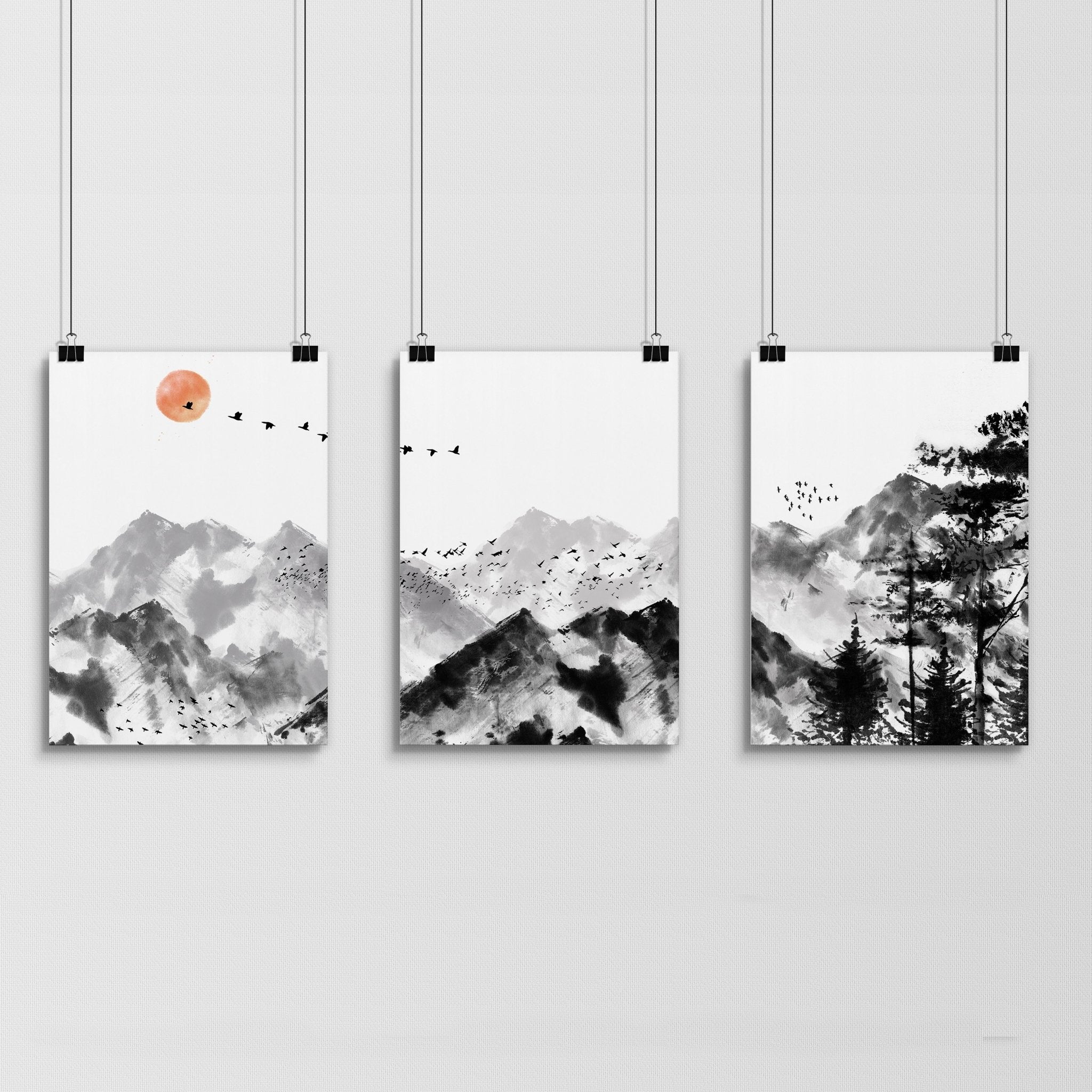 Set of 3 Scandi wall art prints featuring modern minimalist designs in grey, black, and white, elegantly framed.