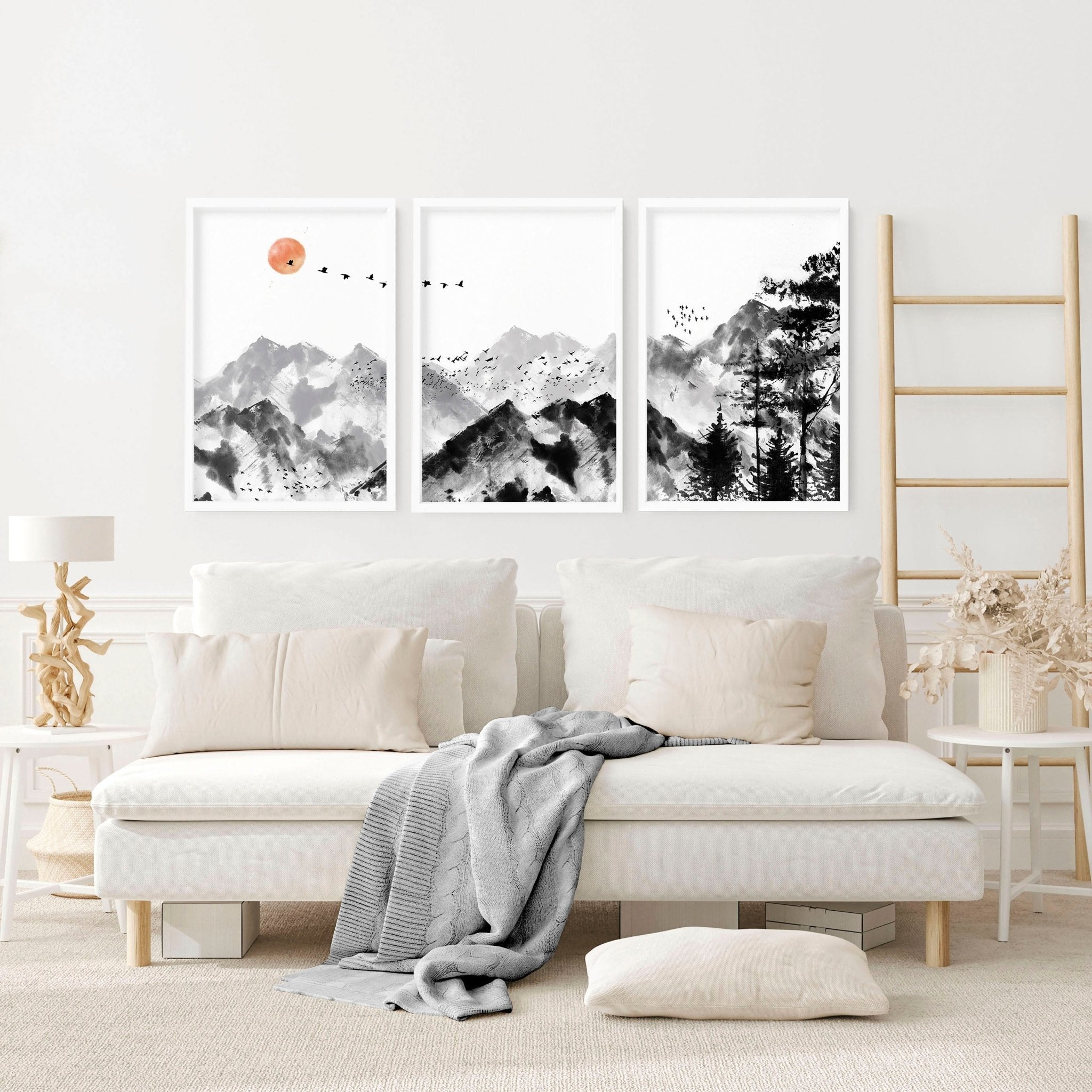 Set of 3 Scandi wall art prints featuring modern minimalist designs in grey, black, and white, elegantly framed.