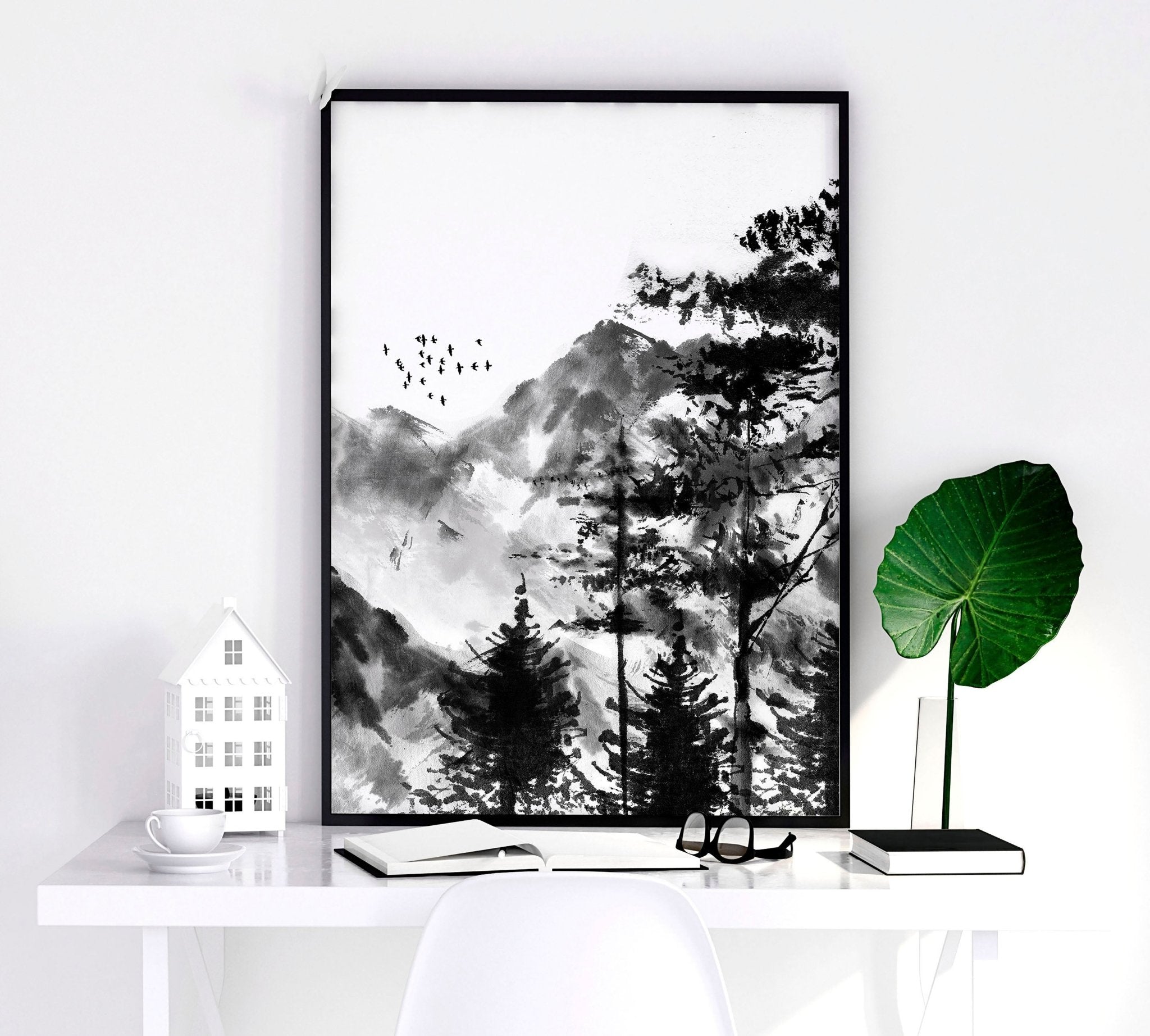 Set of 3 Scandi wall art prints featuring modern minimalist designs in grey, black, and white, elegantly framed.