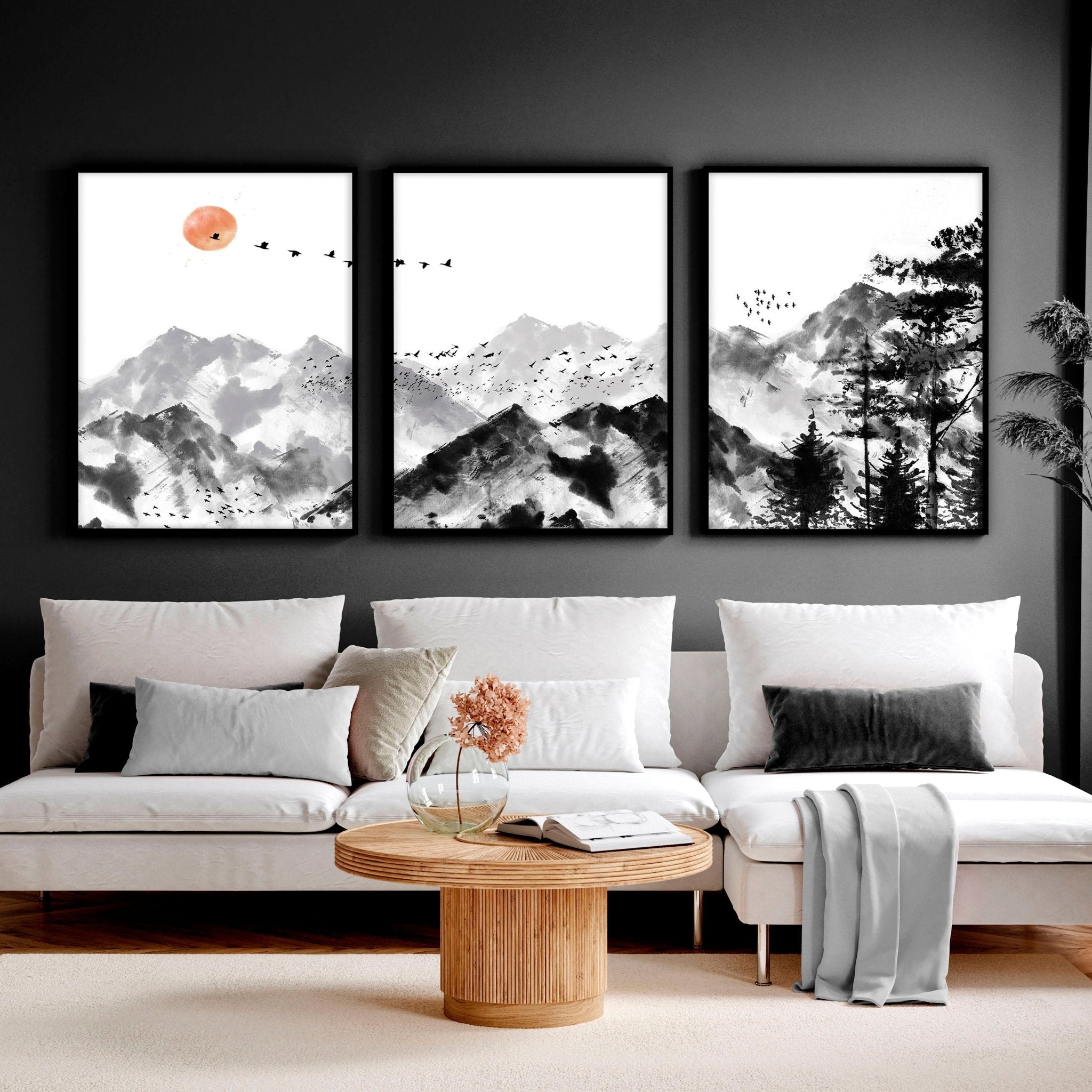Set of 3 Scandi wall art prints featuring modern minimalist designs in grey, black, and white, elegantly framed.