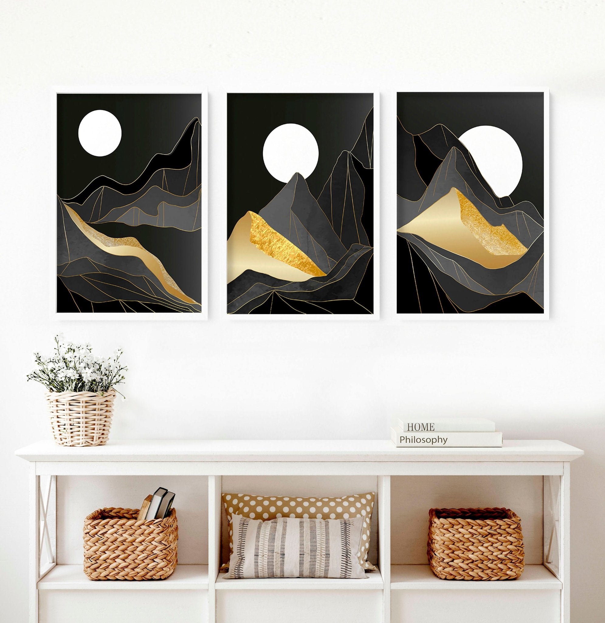 Set of 3 Scandinavian wall art prints featuring serene landscapes in black, grey, and gold, perfect for living room decor.