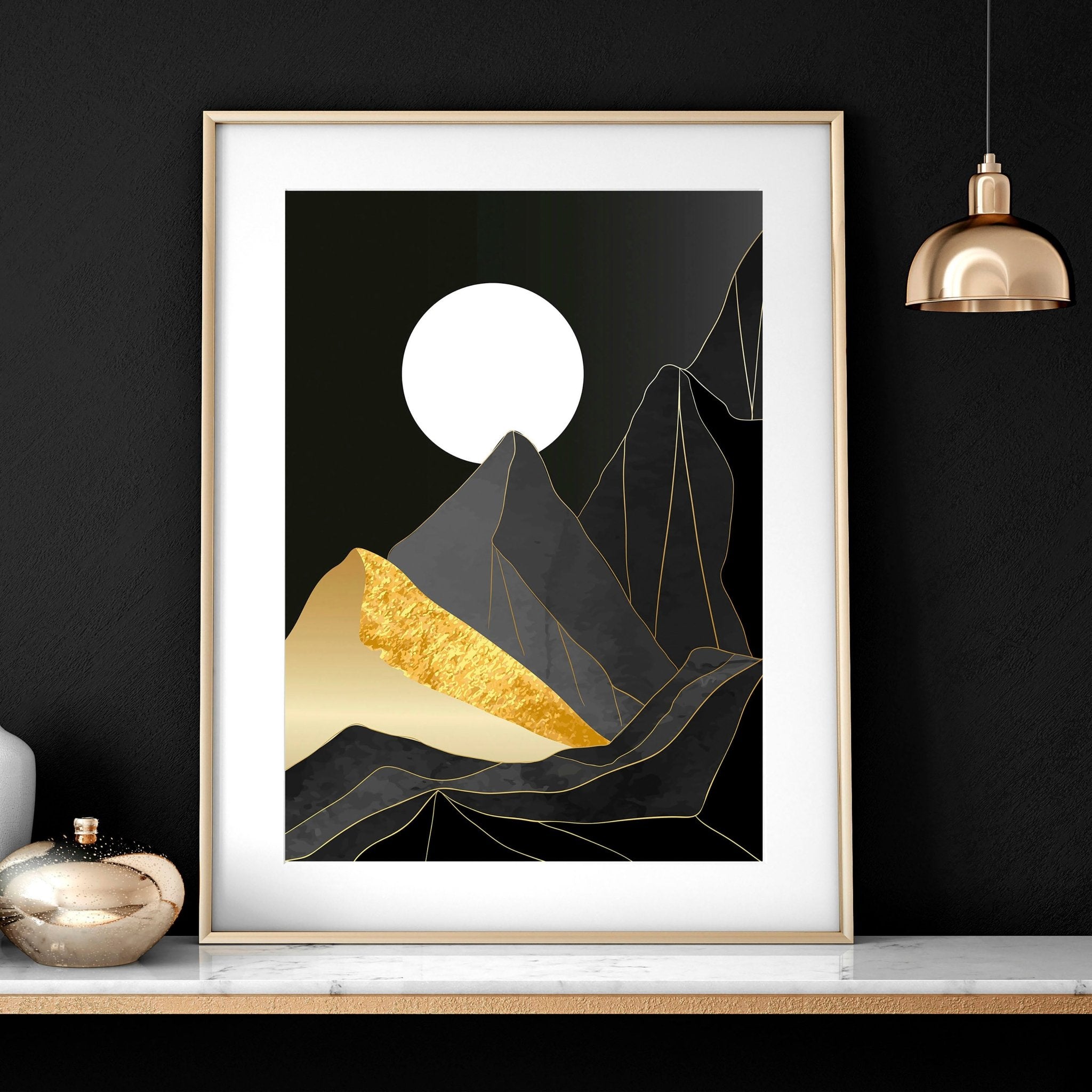 Set of 3 Scandinavian wall art prints featuring serene landscapes in black, grey, and gold, perfect for living room decor.