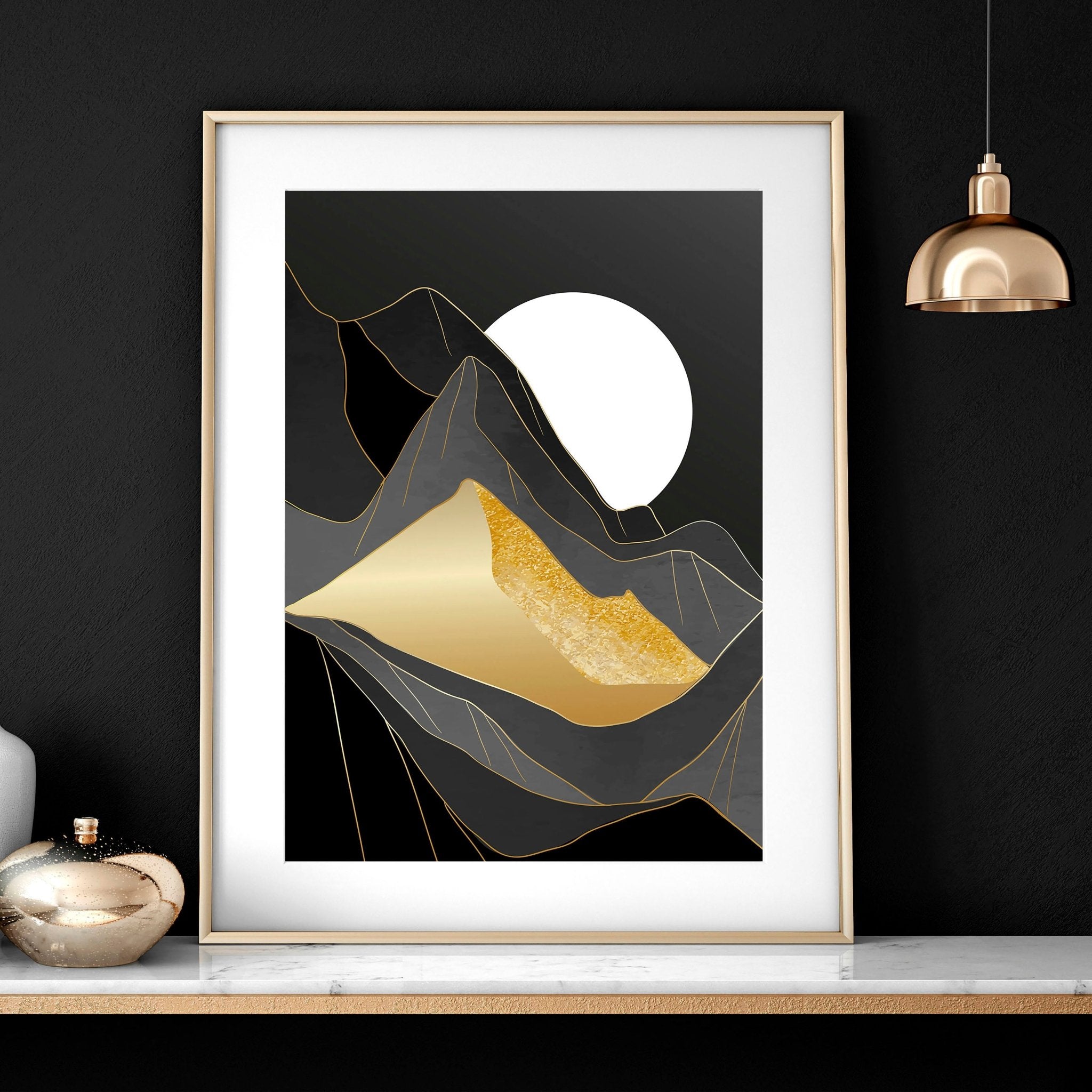 Set of 3 Scandinavian wall art prints featuring serene landscapes in black, grey, and gold, perfect for living room decor.
