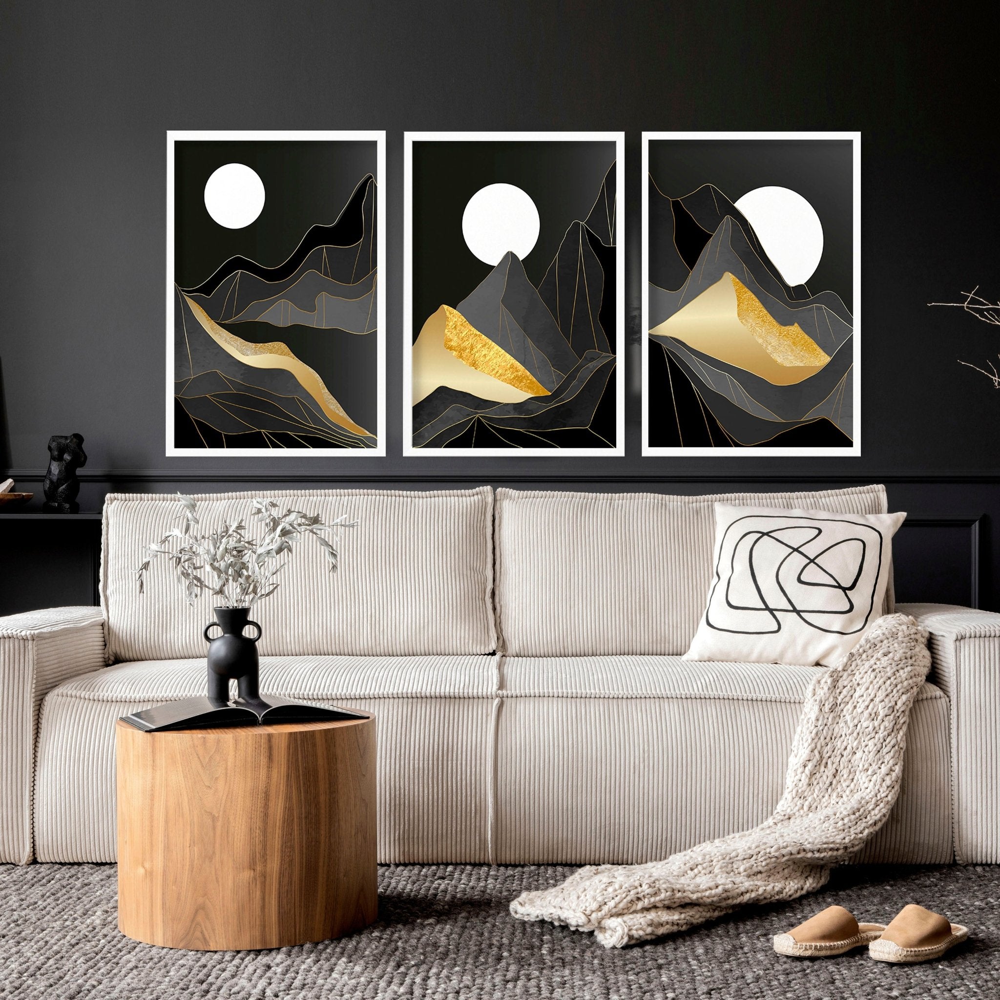 Set of 3 Scandinavian wall art prints featuring serene landscapes in black, grey, and gold, perfect for living room decor.