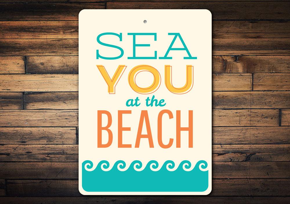 A vibrant See You At The Beach Sign made of durable aluminum, featuring beach-themed graphics and customizable text, perfect for home decor.