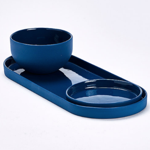 TRI Serving Set featuring a long tray, round container, and round dish in multiple colors, crafted from high-quality porcelain.