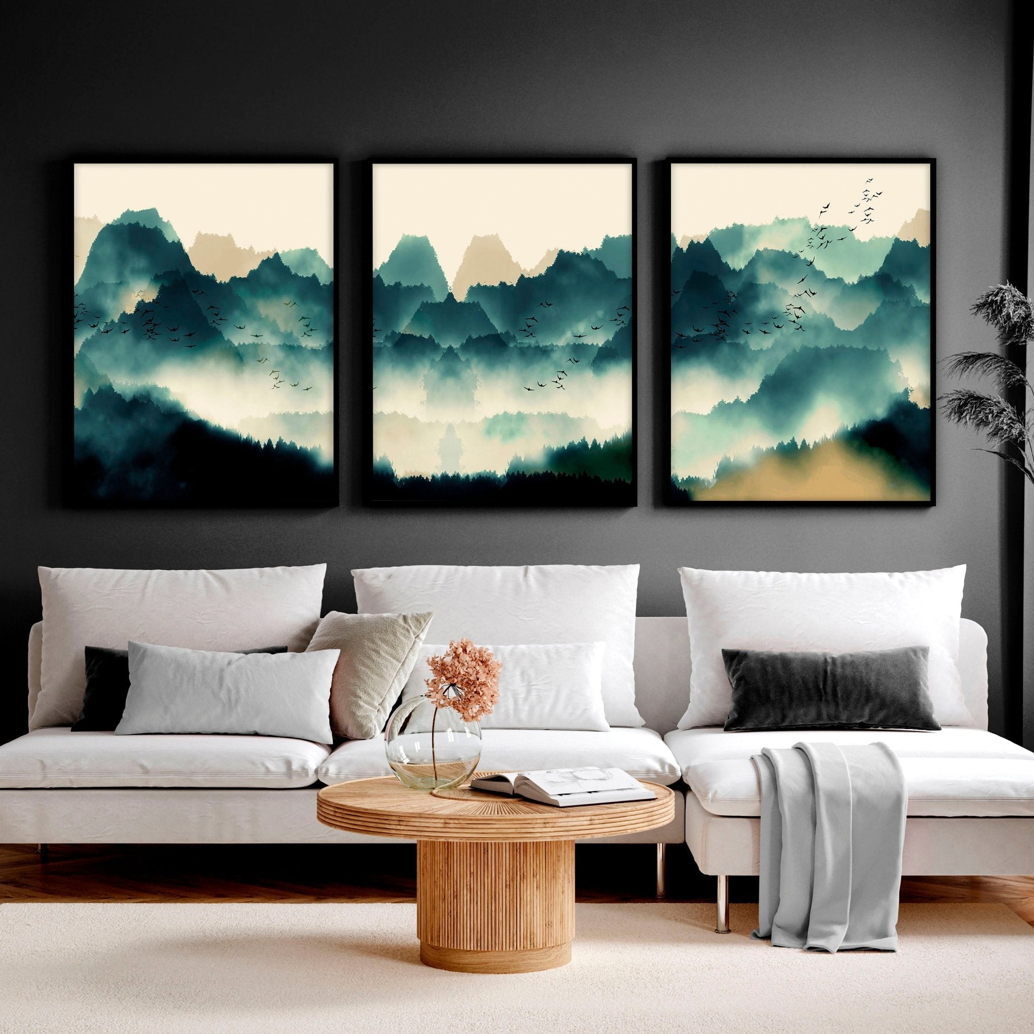 A set of 3 framed Scandinavian wall art prints featuring serene teal and beige landscapes, elegantly displayed in black or white frames.