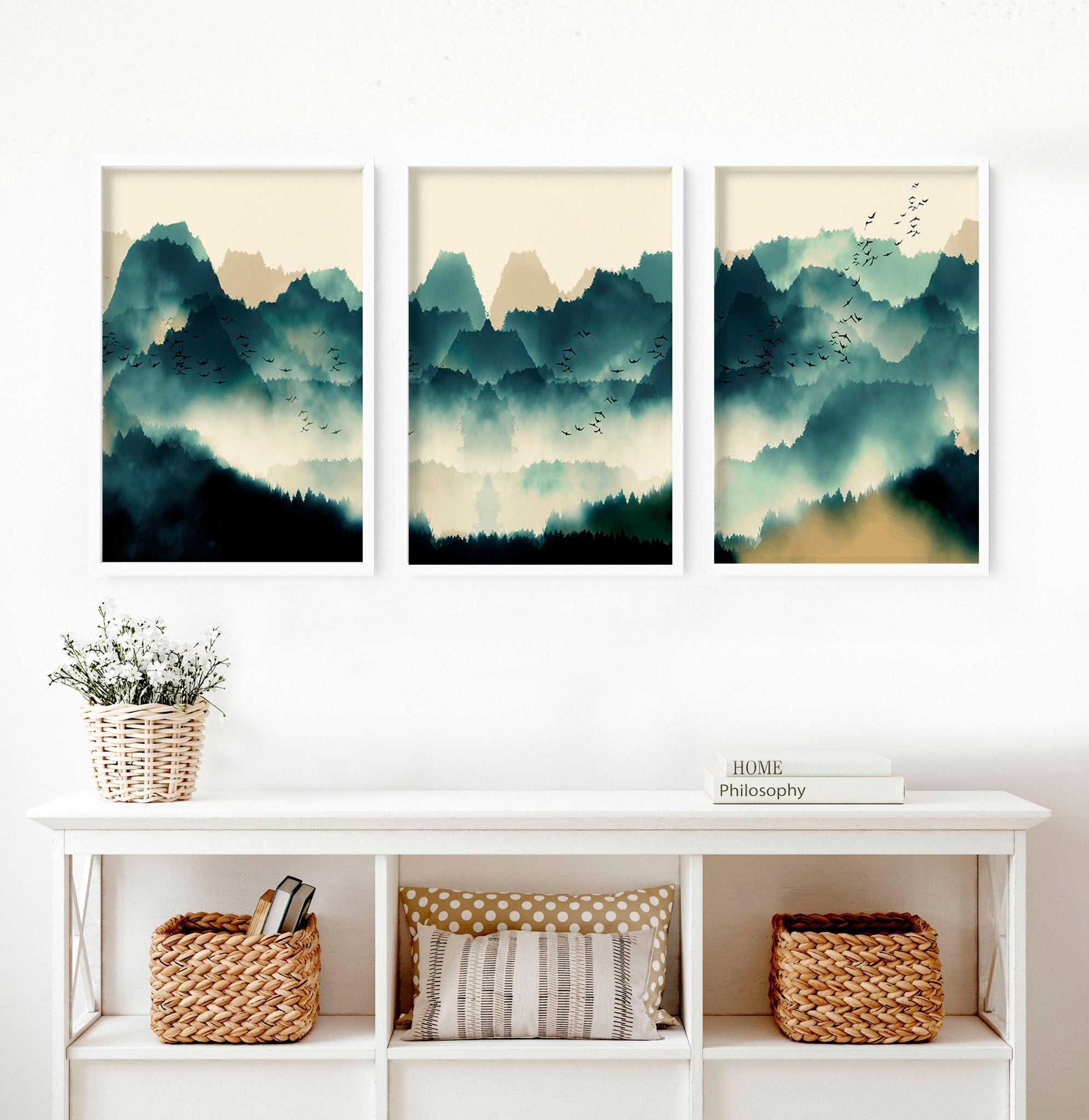 A set of 3 framed Scandinavian wall art prints featuring serene teal and beige landscapes, elegantly displayed in black or white frames.