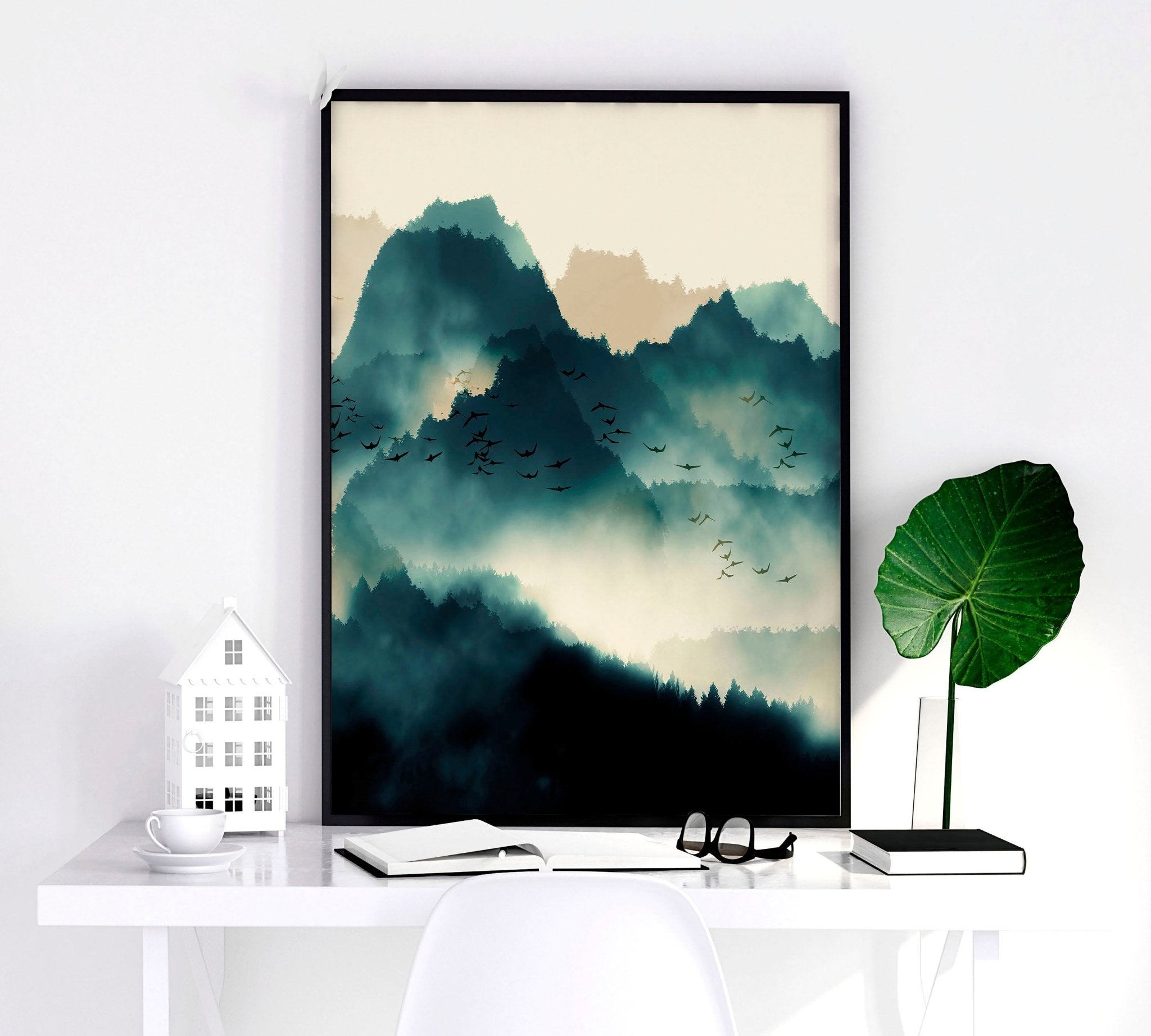 A set of 3 framed Scandinavian wall art prints featuring serene teal and beige landscapes, elegantly displayed in black or white frames.