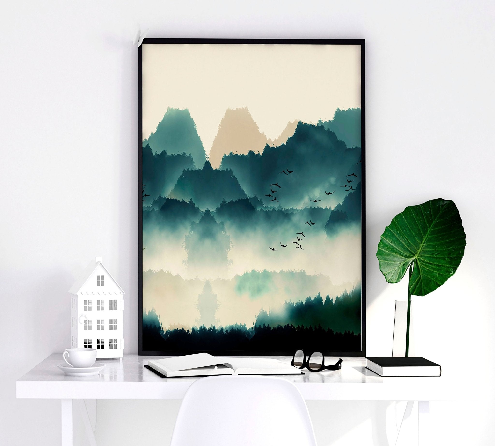 A set of 3 framed Scandinavian wall art prints featuring serene teal and beige landscapes, elegantly displayed in black or white frames.