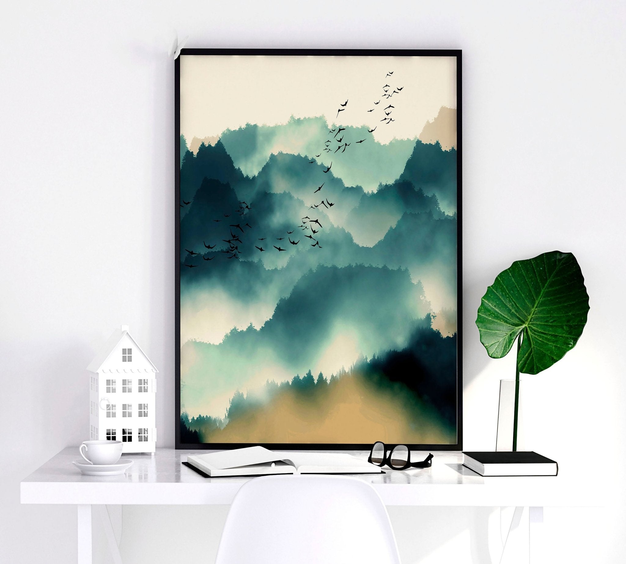 A set of 3 framed Scandinavian wall art prints featuring serene teal and beige landscapes, elegantly displayed in black or white frames.