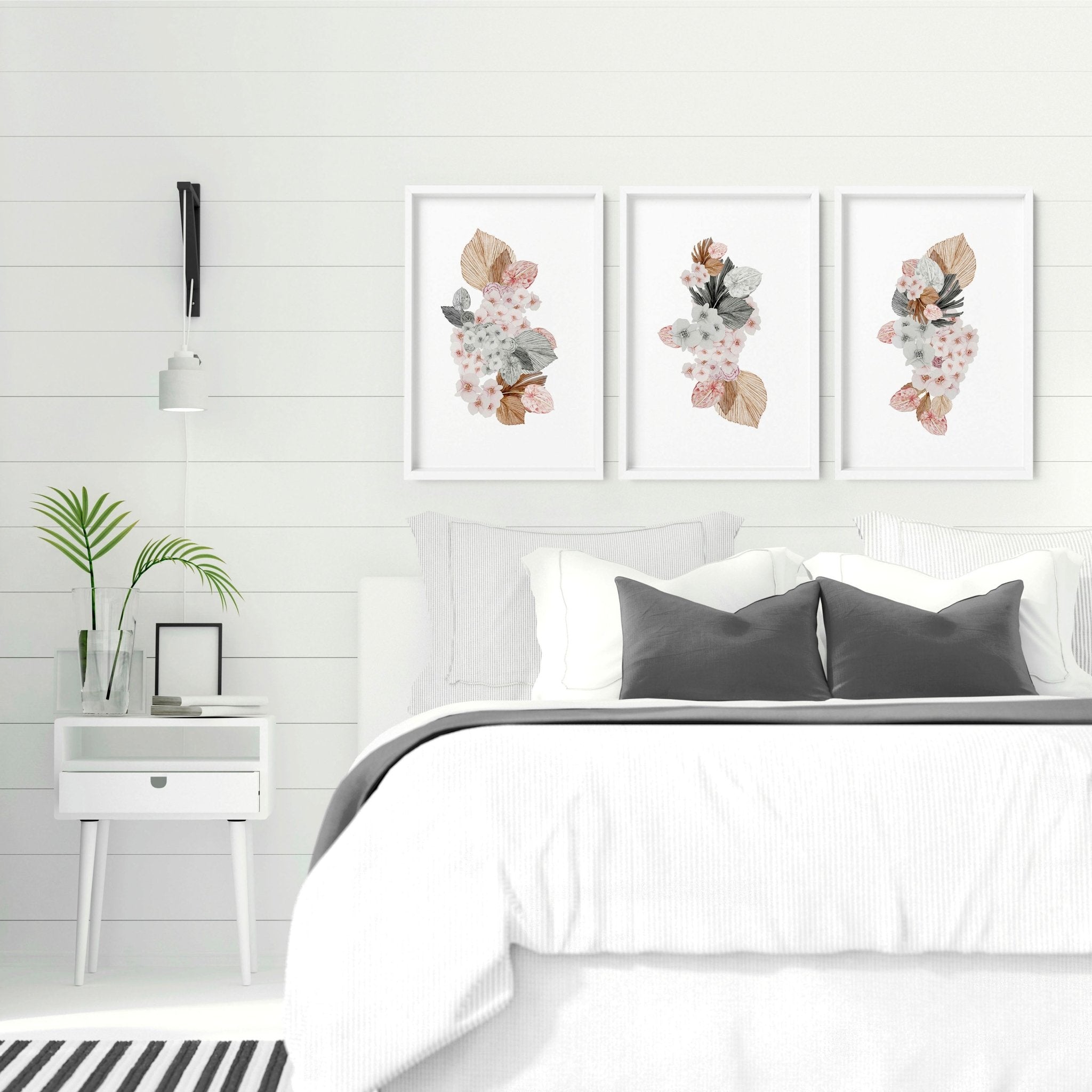 Set of 3 shabby chic wall art prints featuring delicate floral bouquets in soft blush pink and grey tones, perfect for bedroom decor.