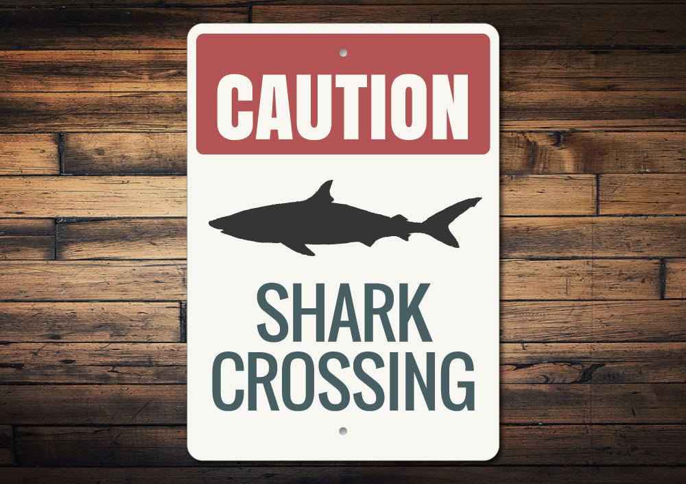 A decorative Shark Caution Sign made of high-quality aluminum, featuring a vibrant design suitable for coastal decor.