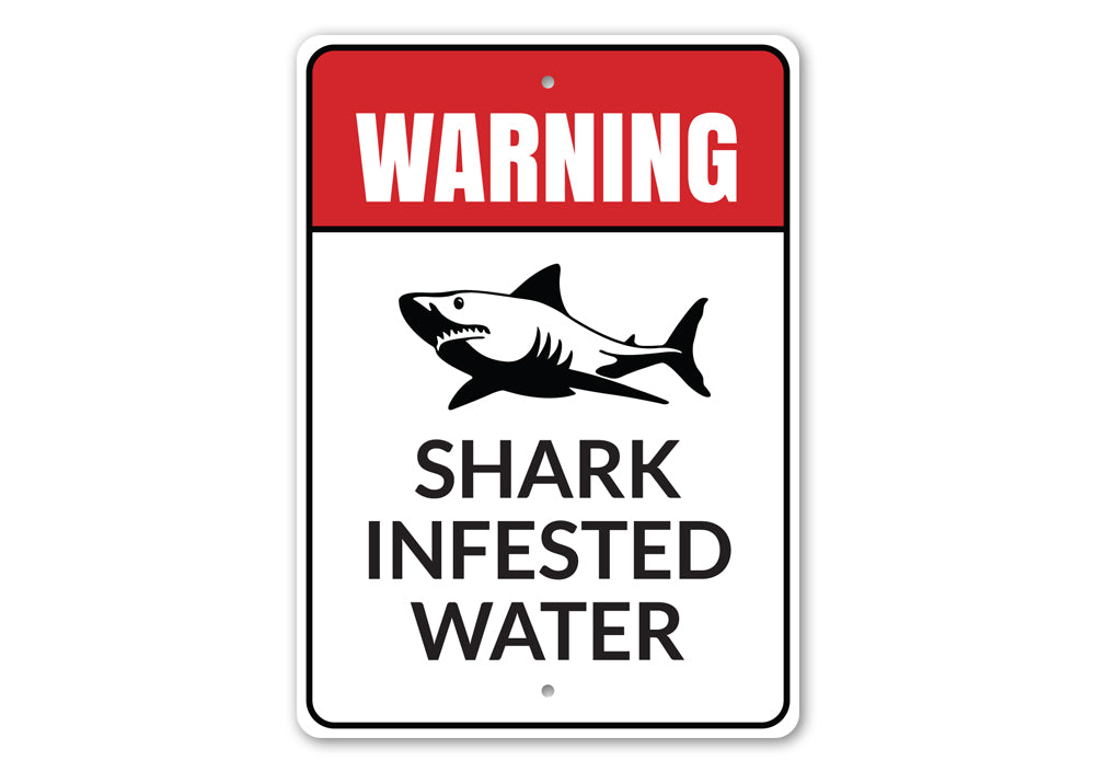 A decorative Shark Infested Water Sign made of aluminum, featuring vibrant colors and a beach-themed design, perfect for coastal decor.