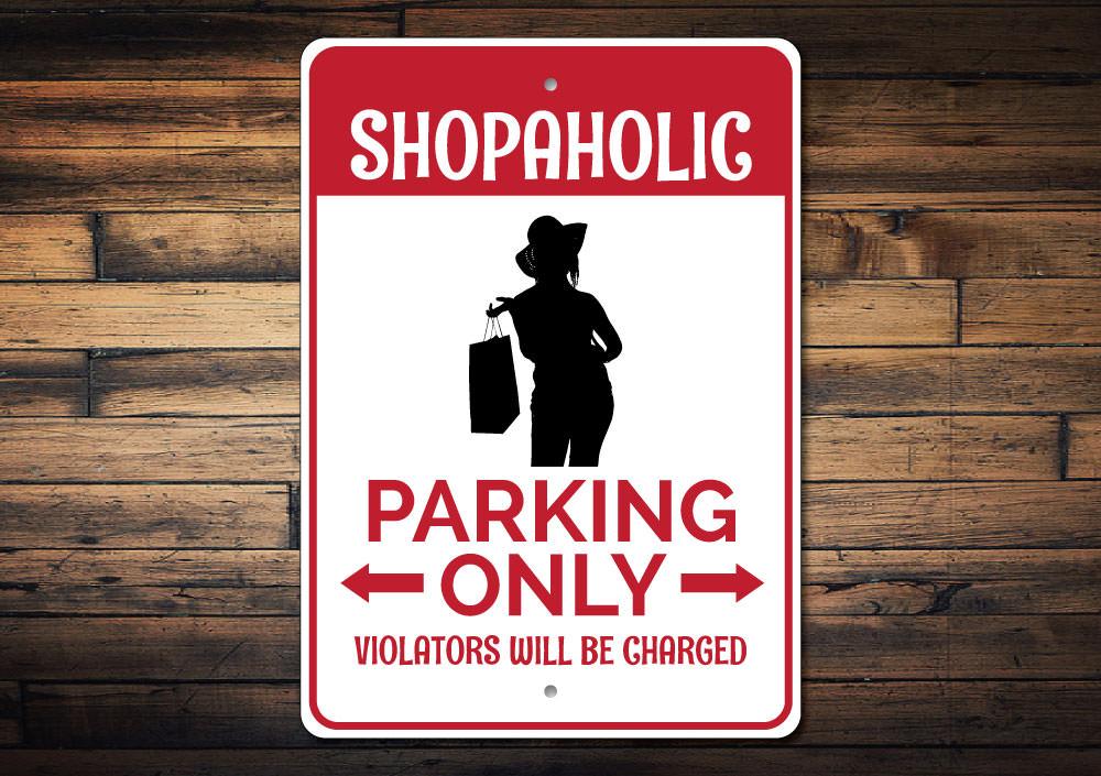 Shopaholic Parking Sign made of durable aluminum, featuring customizable text and pre-drilled holes for easy mounting.