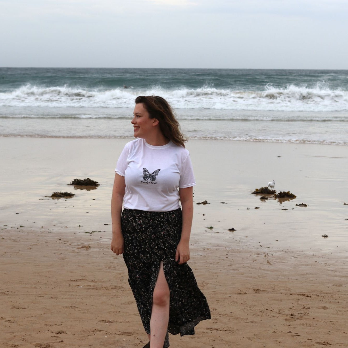 A stylish Short-Sleeve Unisex T-Shirt displayed on a mannequin, showcasing its soft fabric and durable stitching.