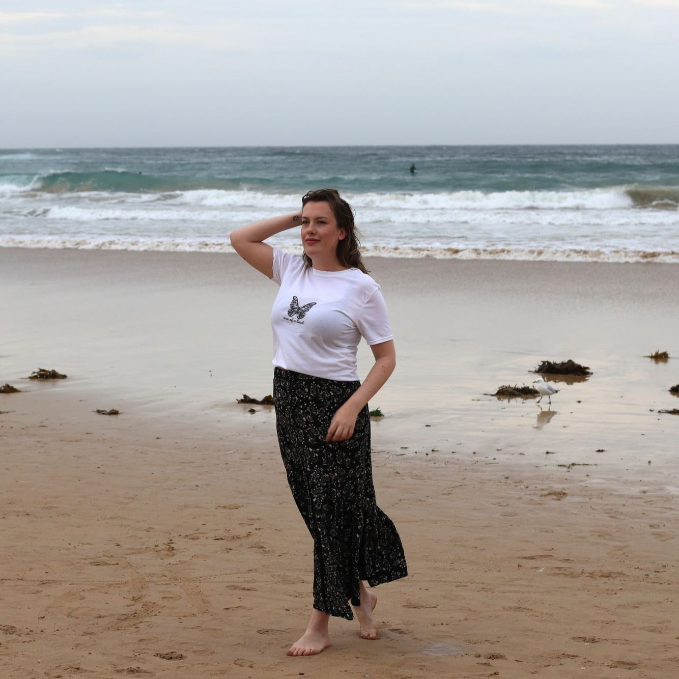 A stylish Short-Sleeve Unisex T-Shirt displayed on a mannequin, showcasing its soft fabric and durable stitching.