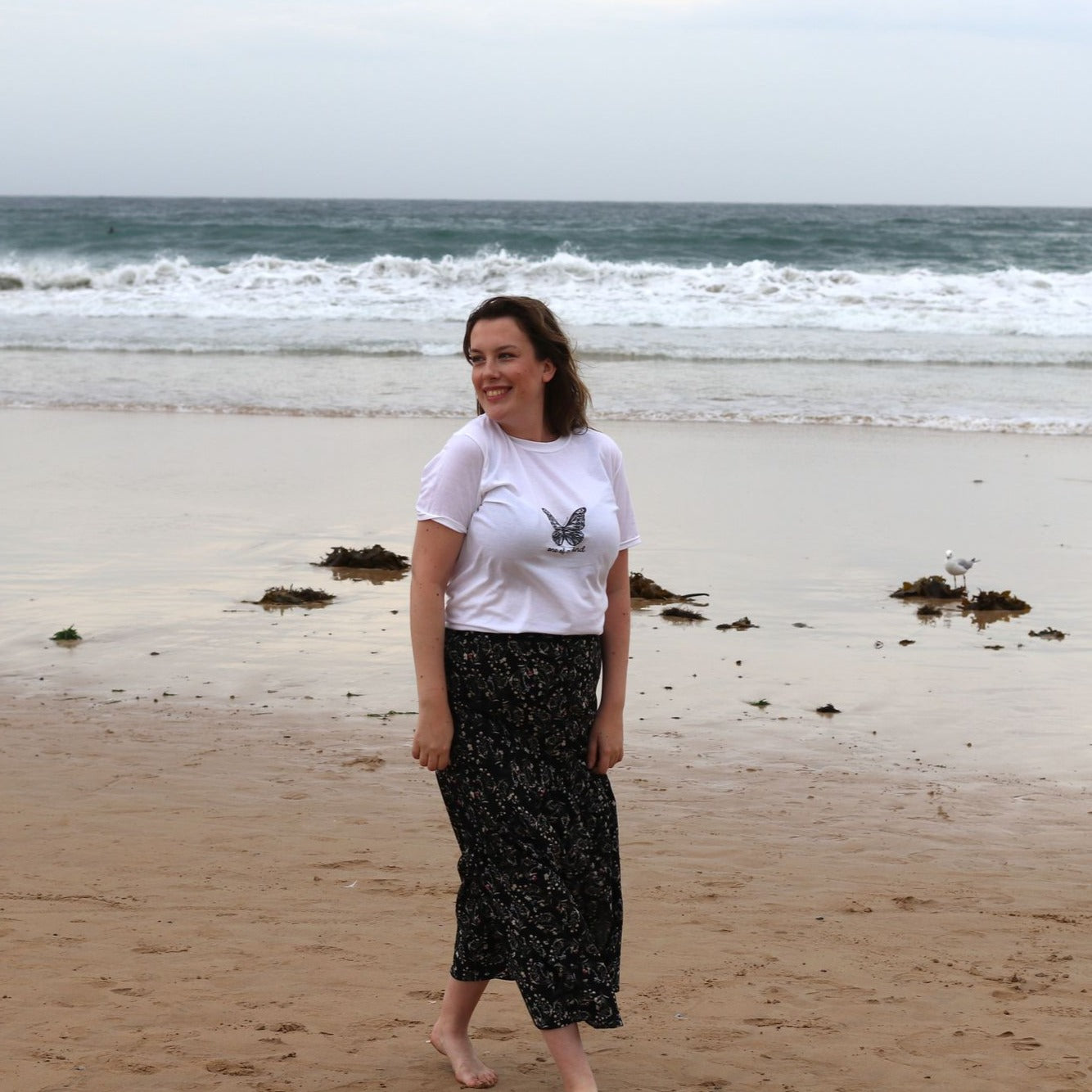 A stylish Short-Sleeve Unisex T-Shirt displayed on a mannequin, showcasing its soft fabric and durable stitching.