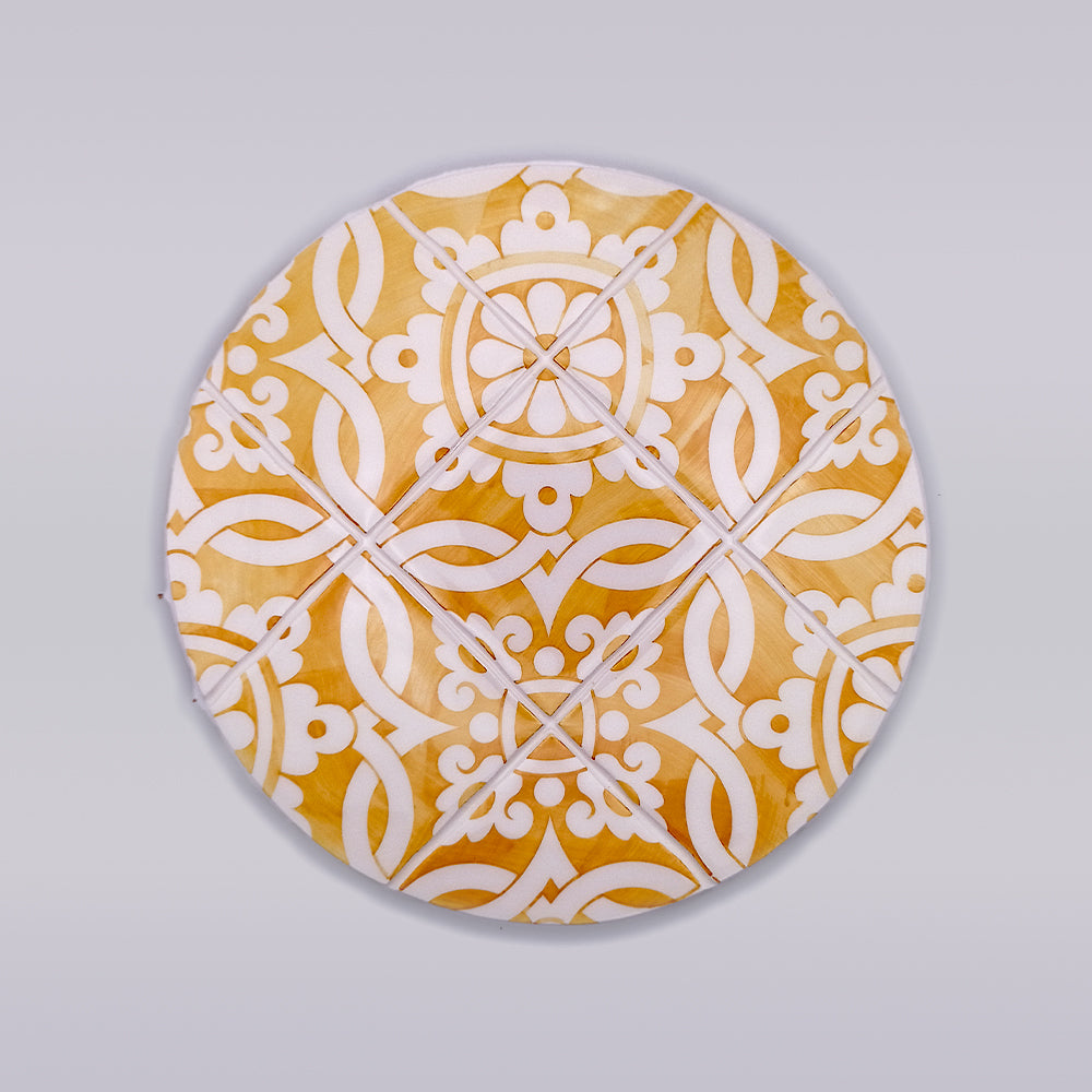 Colorful Sintra Ceramic Kitchen Trivet with unique hand-painted designs, perfect for protecting countertops.