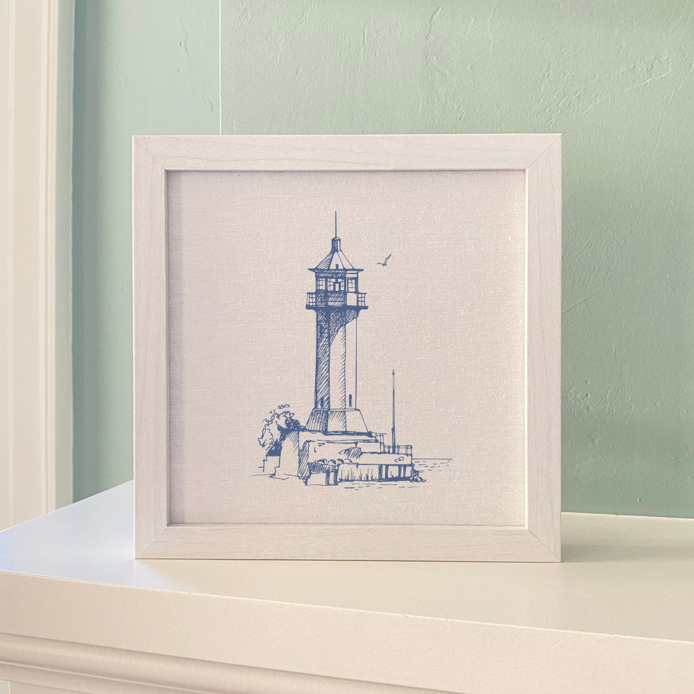 Sketched Lighthouse Framed Sign with a wood frame, featuring eco-friendly printing on a linen-look background.
