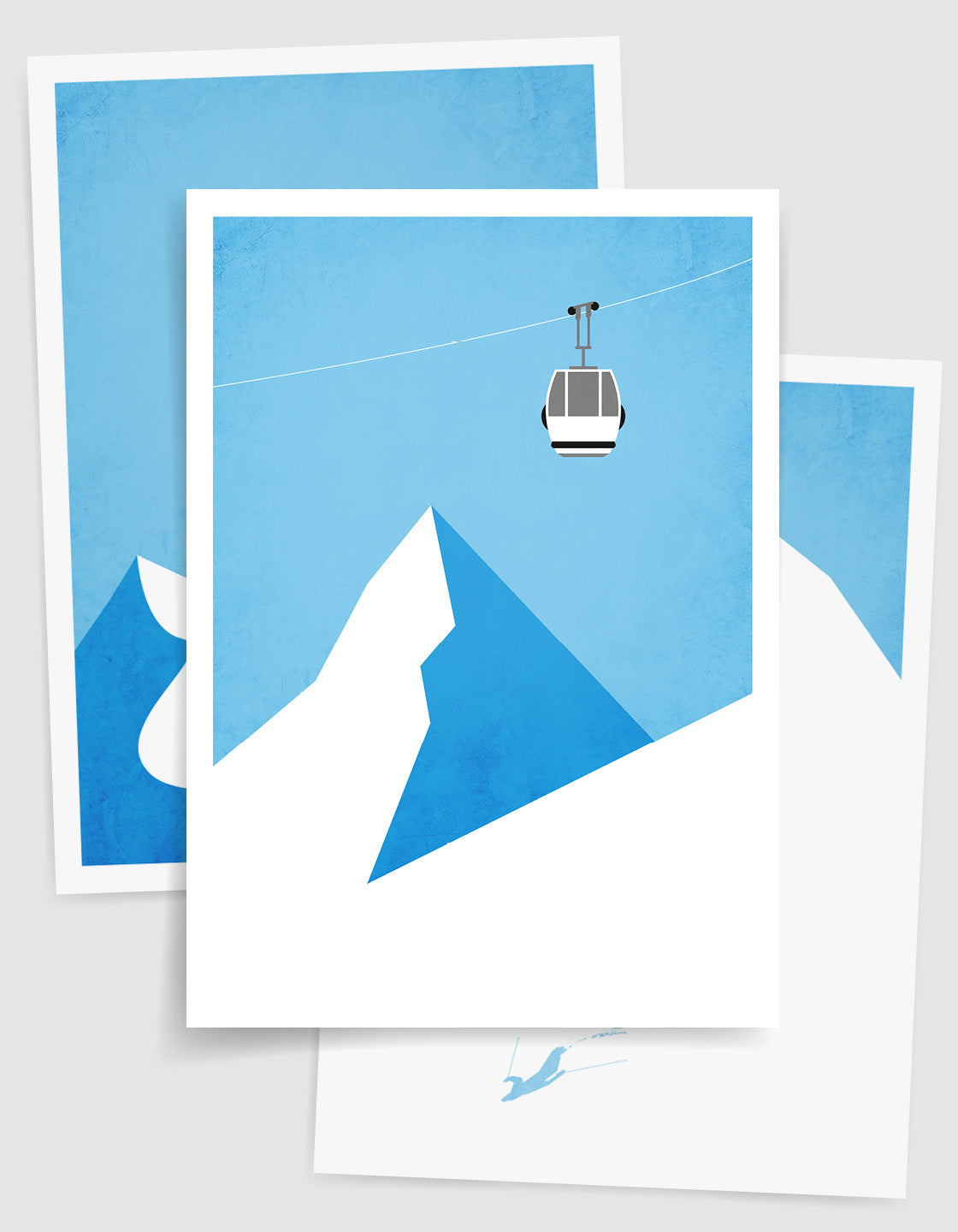 A modern ski gallery wall featuring minimalist ski art prints in various frames, showcasing winter landscapes and skiing themes.