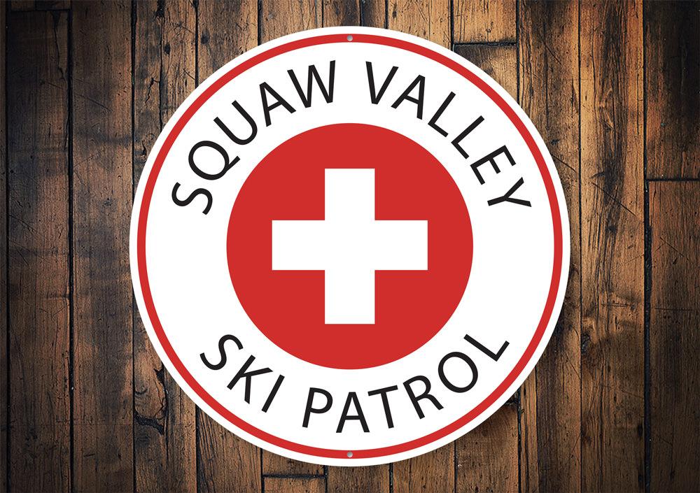 Ski Patrol Circle Sign made of high-quality aluminum, featuring a decorative ski theme, perfect for ski lodges and enthusiasts.