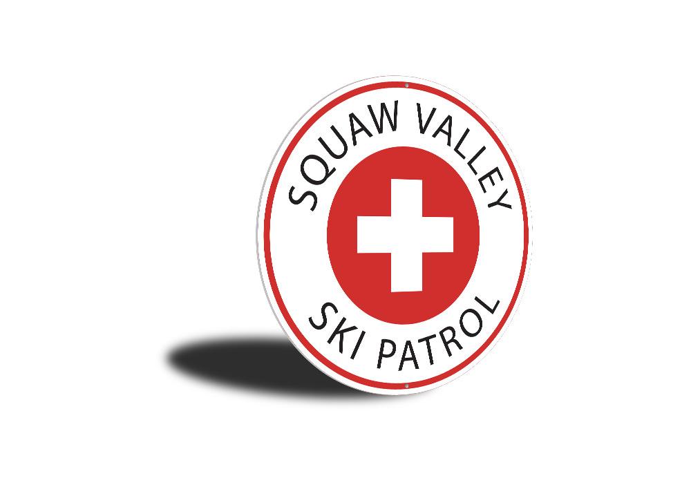 Ski Patrol Circle Sign made of high-quality aluminum, featuring a decorative ski theme, perfect for ski lodges and enthusiasts.