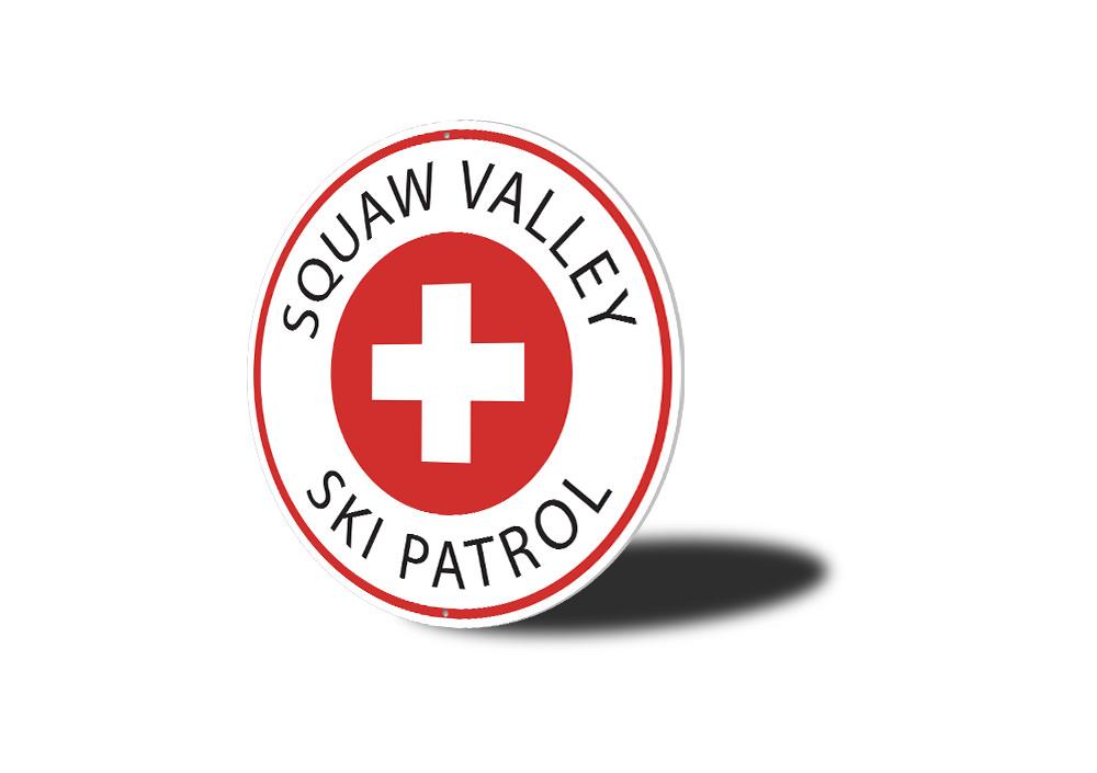 Ski Patrol Circle Sign made of high-quality aluminum, featuring a decorative ski theme, perfect for ski lodges and enthusiasts.