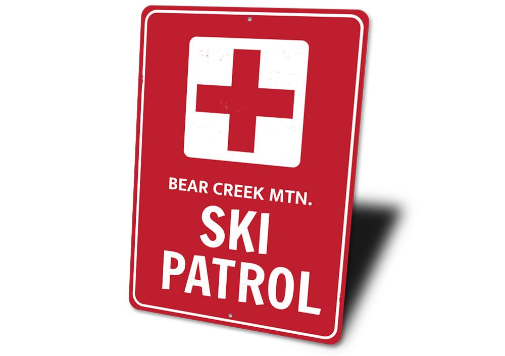 Ski Patrol Cross Sign made of high-quality aluminum, featuring customizable text and pre-drilled holes for easy mounting.