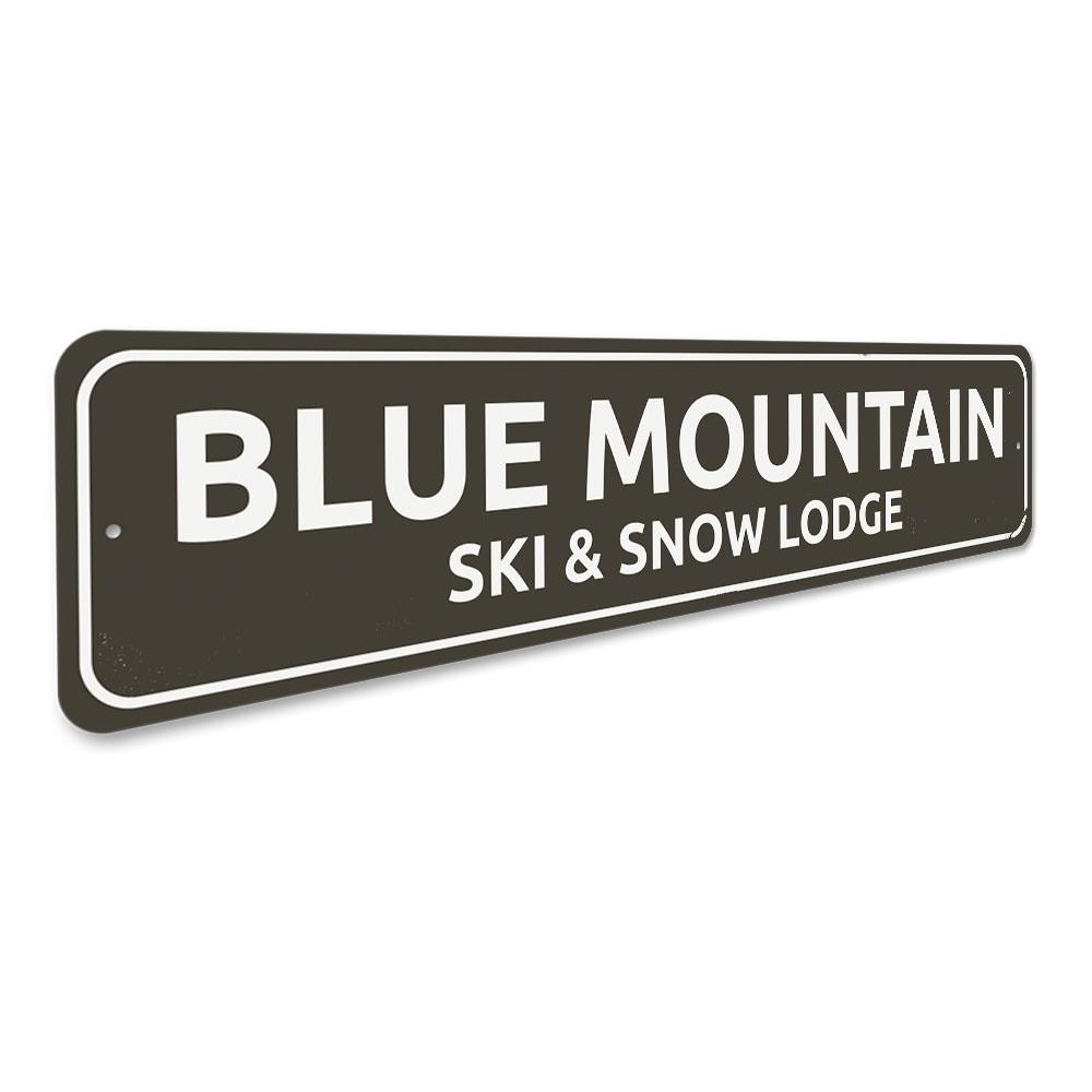 A decorative Ski & Snow Lodge Sign made of high-quality aluminum, featuring customizable text and pre-drilled holes for easy mounting.
