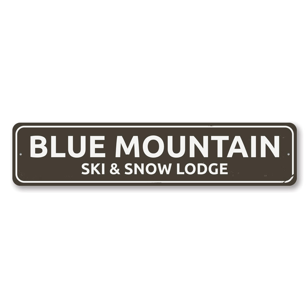 A decorative Ski & Snow Lodge Sign made of high-quality aluminum, featuring customizable text and pre-drilled holes for easy mounting.