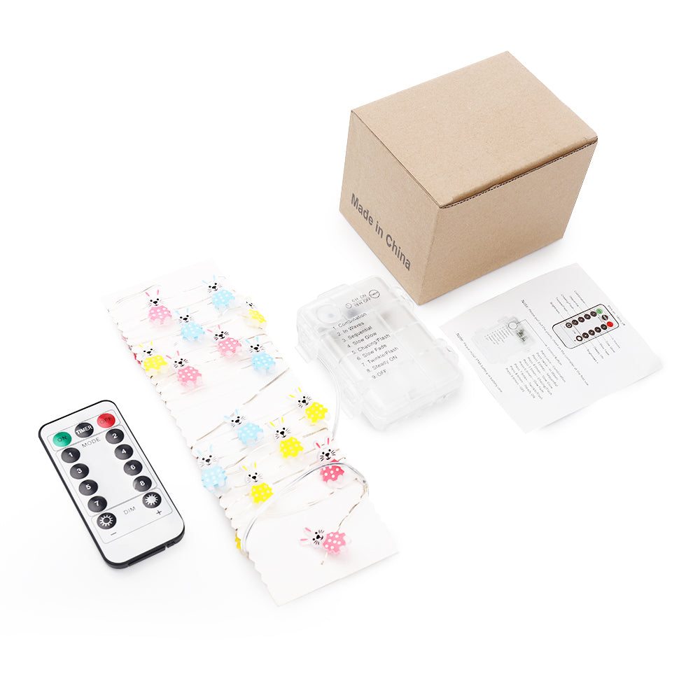 A string of 30 LED bunny-shaped lights, perfect for Easter decorations, showcasing warm white illumination on a copper wire.