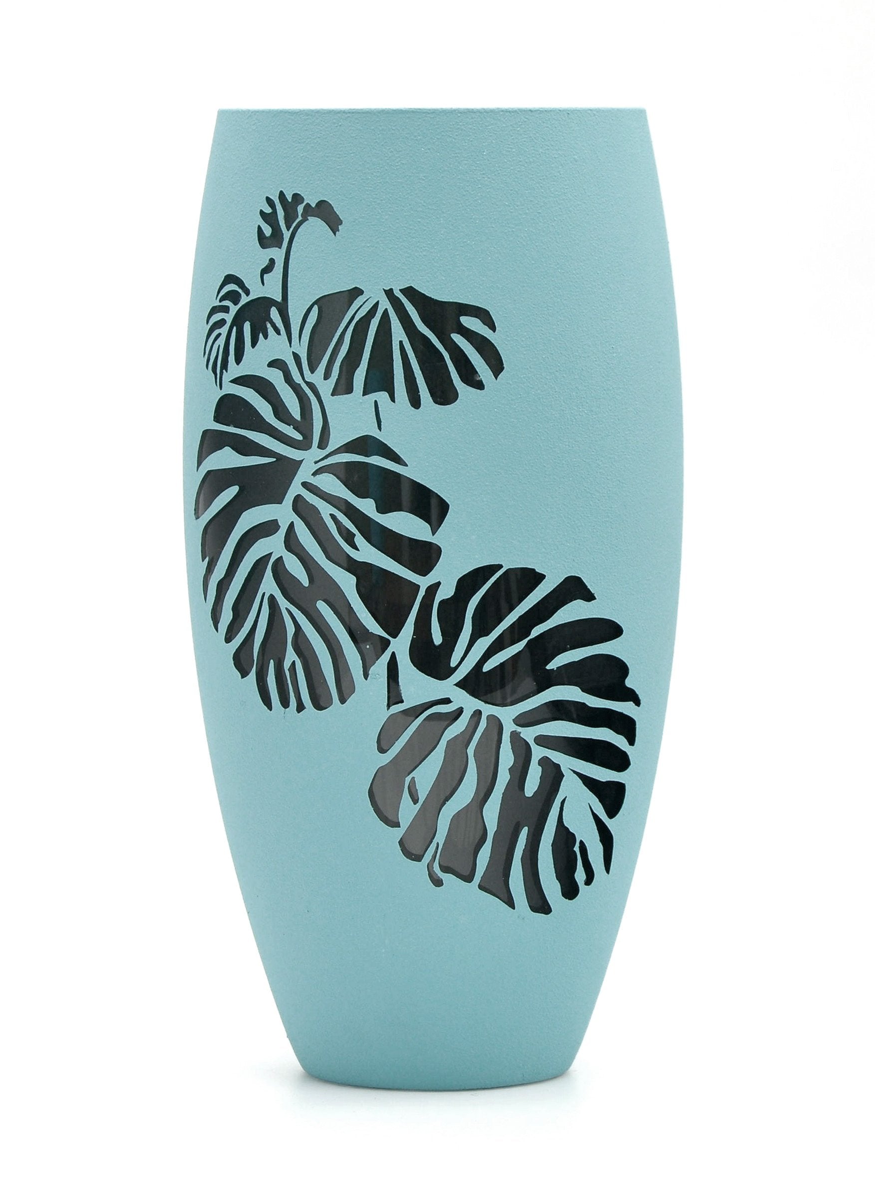 Handmade sky blue glass oval vase with unique hand-painted designs, showcasing artistic flair and elegance.