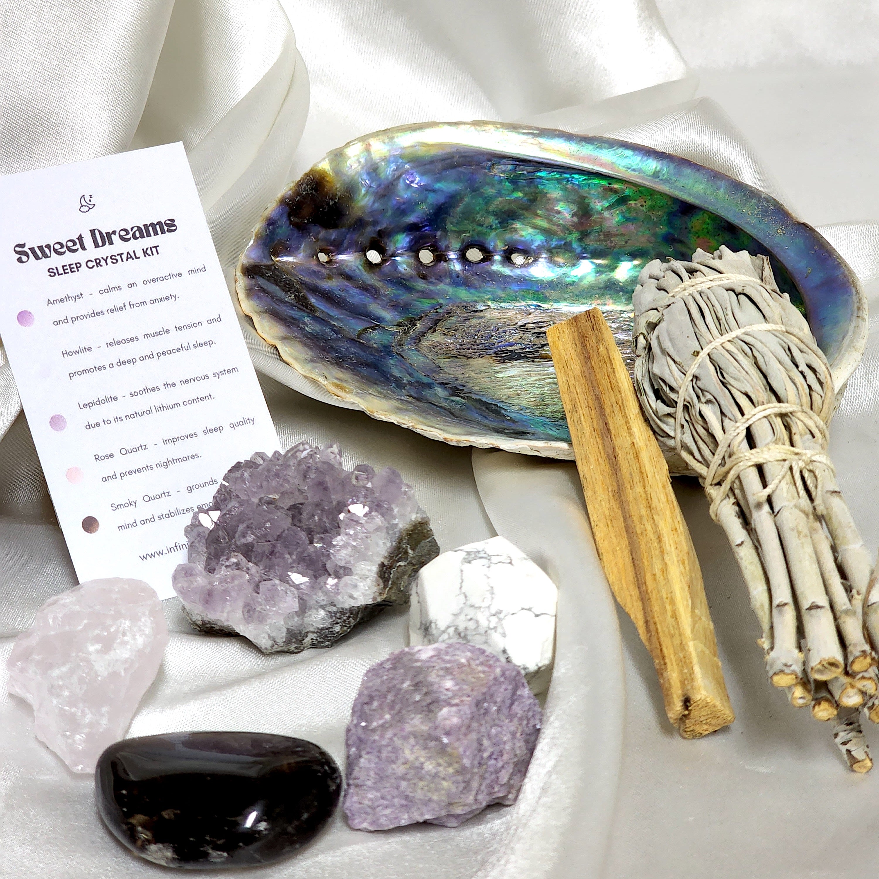 Sweet Dreams Smudge Kit featuring white sage, palo santo, abalone shell, and calming crystals for sleep enhancement.