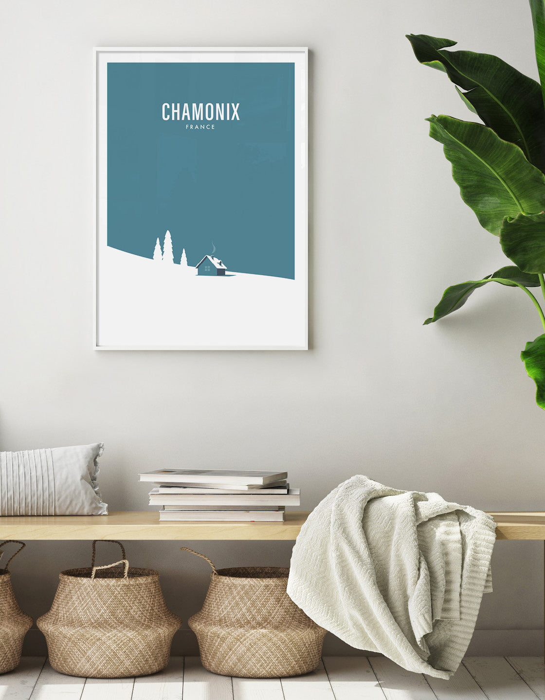 A minimalist art print featuring a serene snowy mountain landscape, inspired by retro ski posters, showcasing a cozy hut amidst the snow.