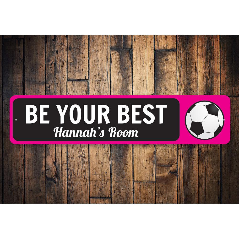 A vibrant Soccer Ball Sign made of durable aluminum, featuring a customizable design perfect for children's rooms.