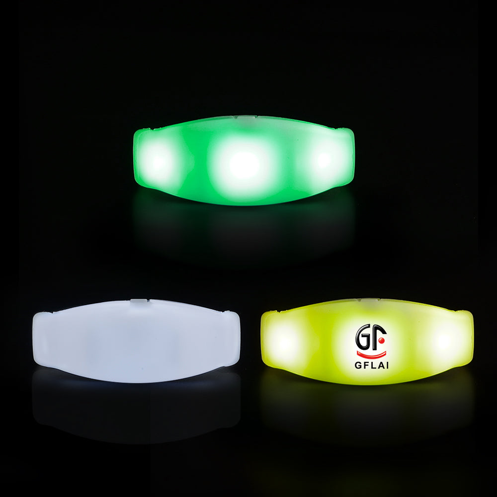 A vibrant pack of 50 Sound Activated LED Wristbands, showcasing various colors and designs, perfect for parties and events.