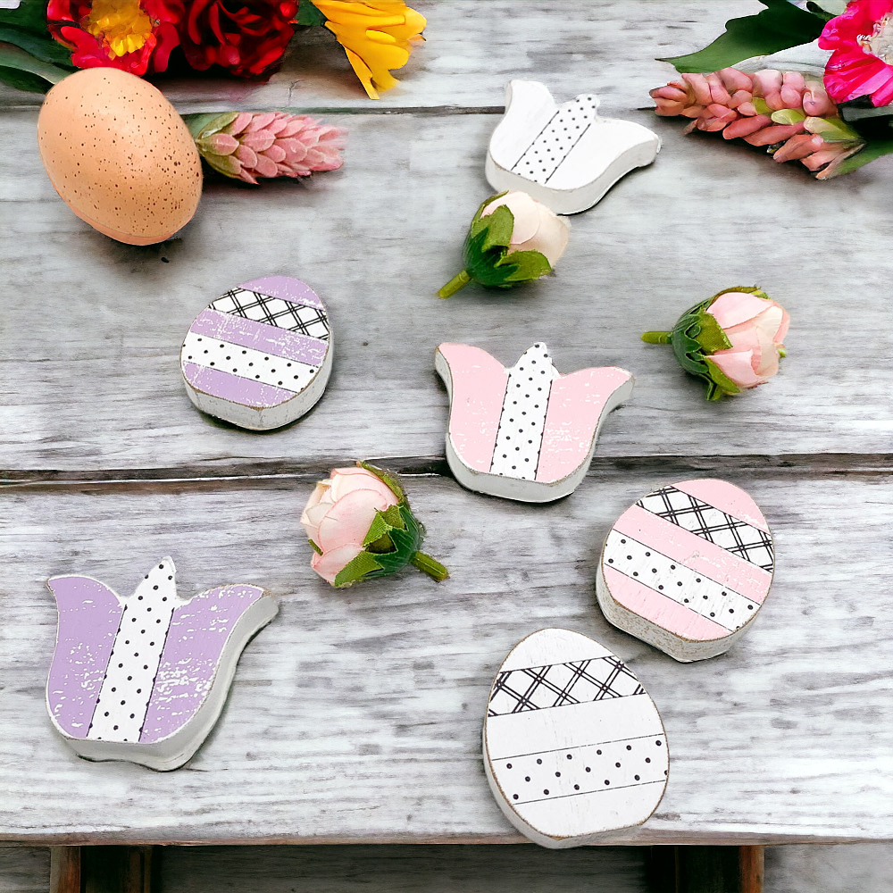 A set of handmade wooden spring accents including tulips and Easter eggs in purple, white, and pink, perfect for seasonal decor.