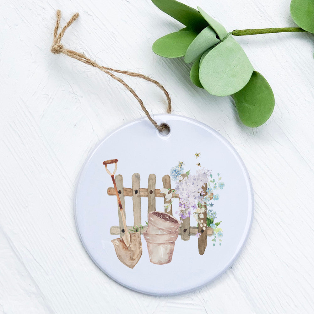 A beautifully crafted porcelain ornament featuring original Spring Planting designs, showcasing vibrant colors and a glossy finish.