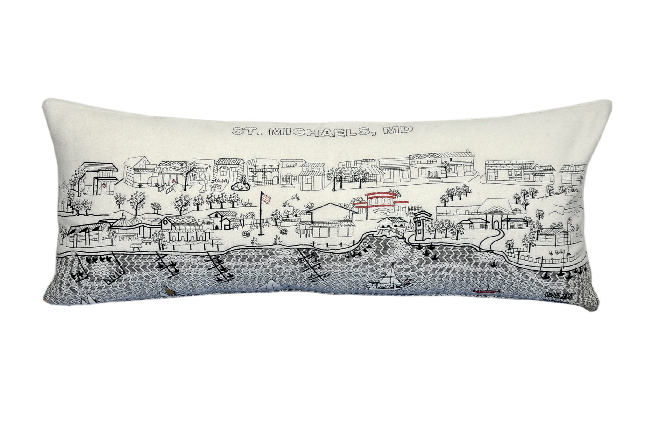 St. Michaels, MD decorative pillow featuring vibrant embroidery and a red zipper, showcasing the charm of Chesapeake Bay.