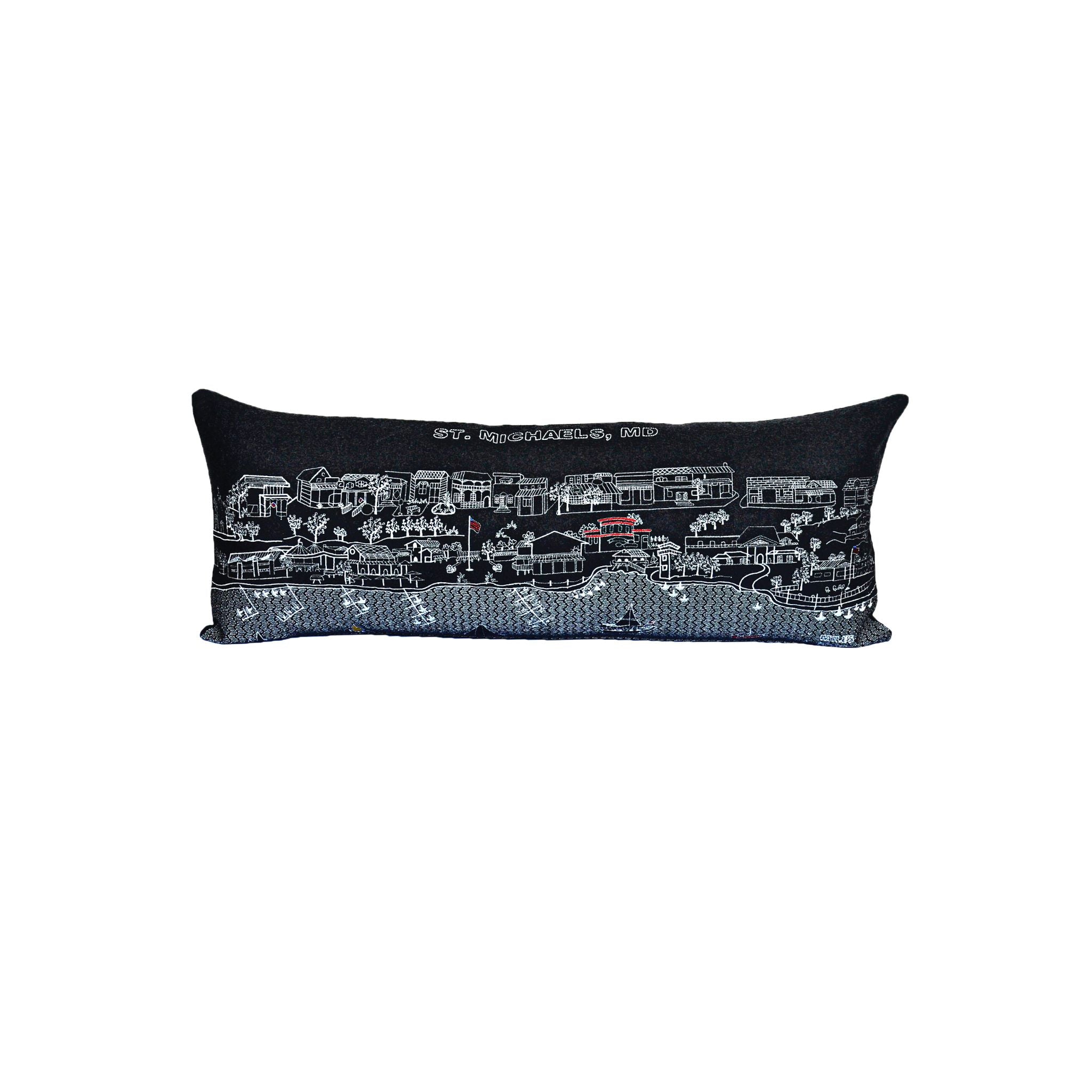 St. Michaels, MD decorative pillow featuring vibrant embroidery and a red zipper, showcasing the charm of Chesapeake Bay.
