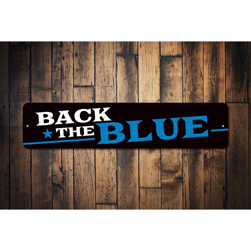 Star Back The Blue Sign made of aluminum, featuring a blue background with a police badge design, ideal for wall decoration.