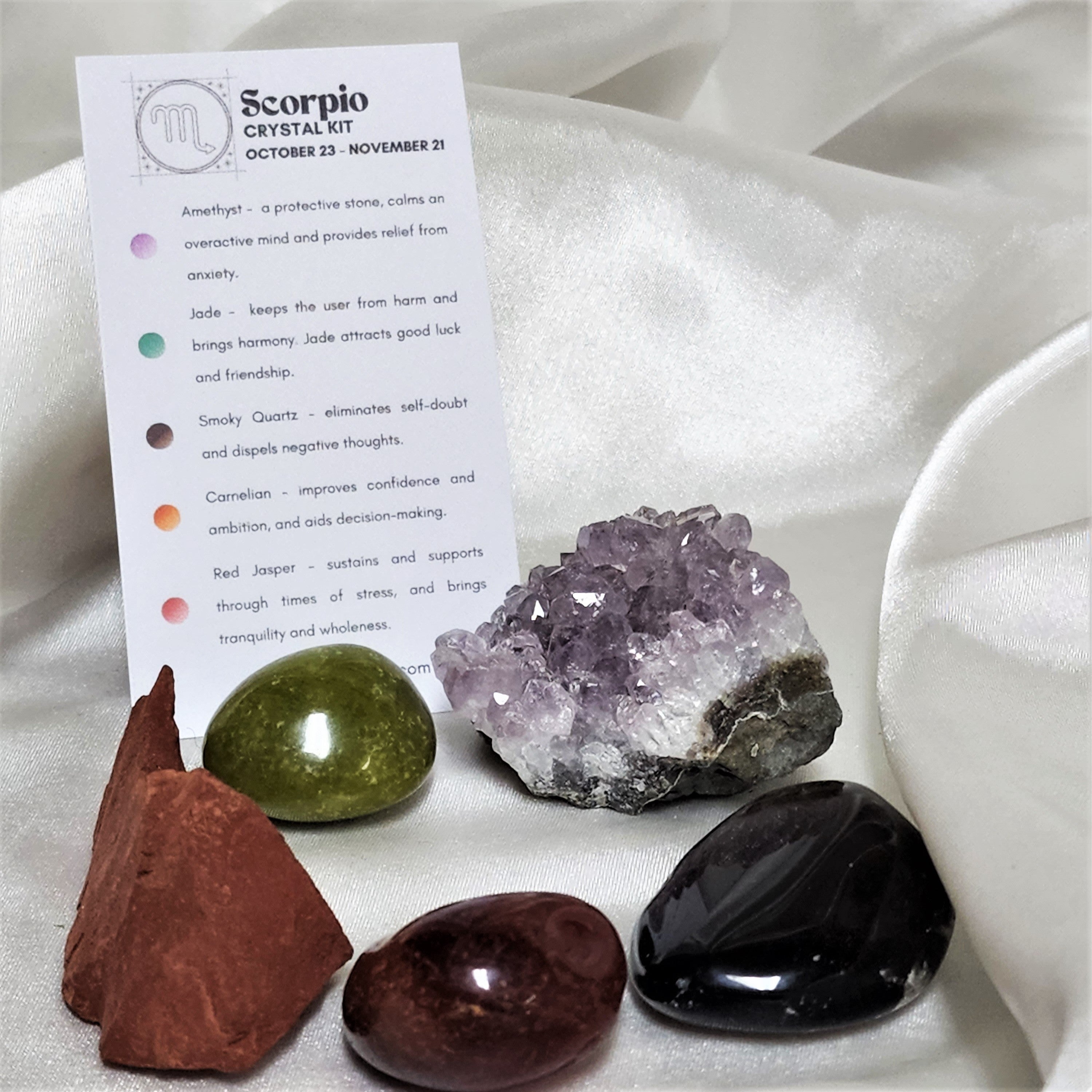 Star Sign Crystal Healing Kit for Scorpio featuring Amethyst, Jade, Smoky Quartz, Red Jasper, and Carnelian in a small pouch.