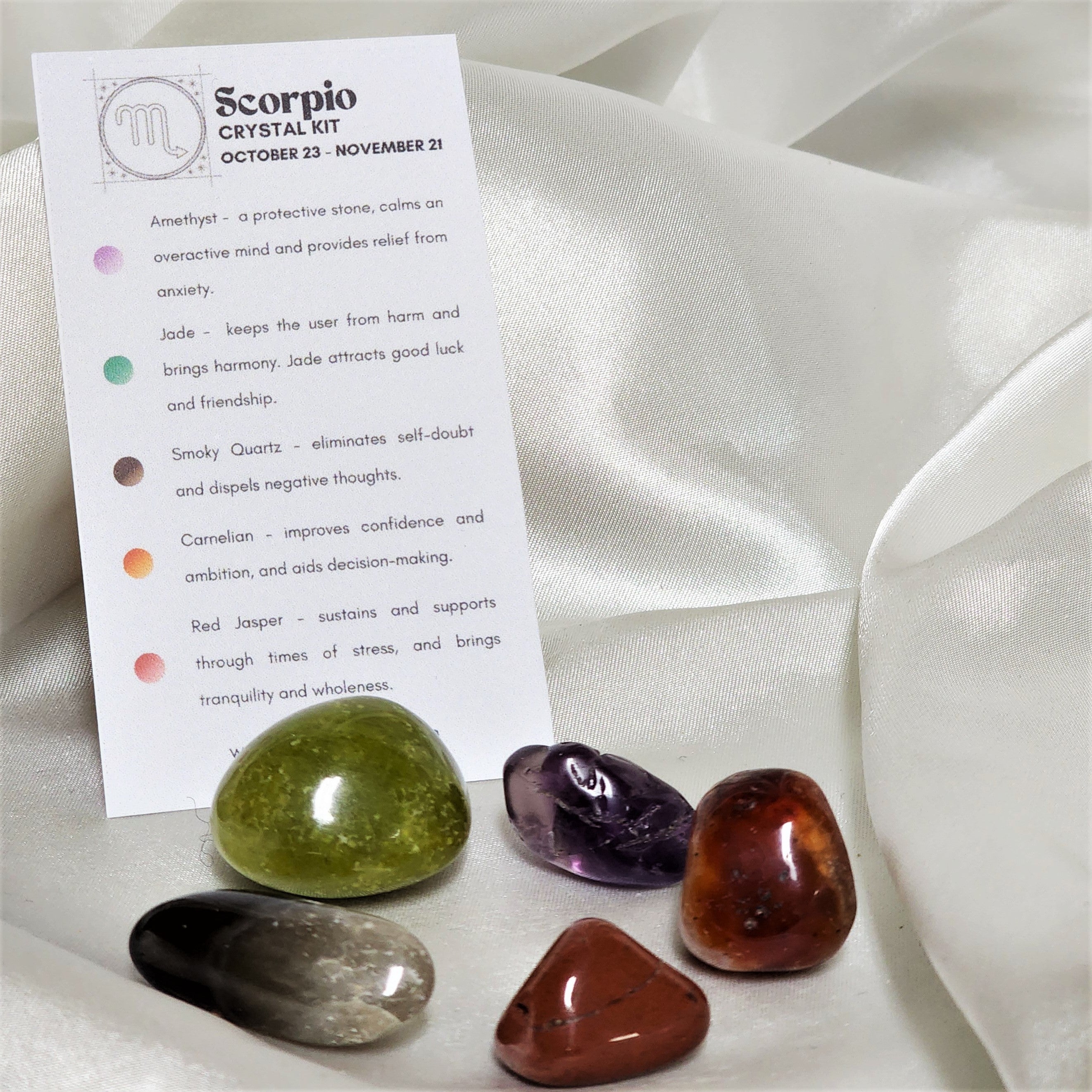 Star Sign Crystal Healing Kit for Scorpio featuring Amethyst, Jade, Smoky Quartz, Red Jasper, and Carnelian in a small pouch.